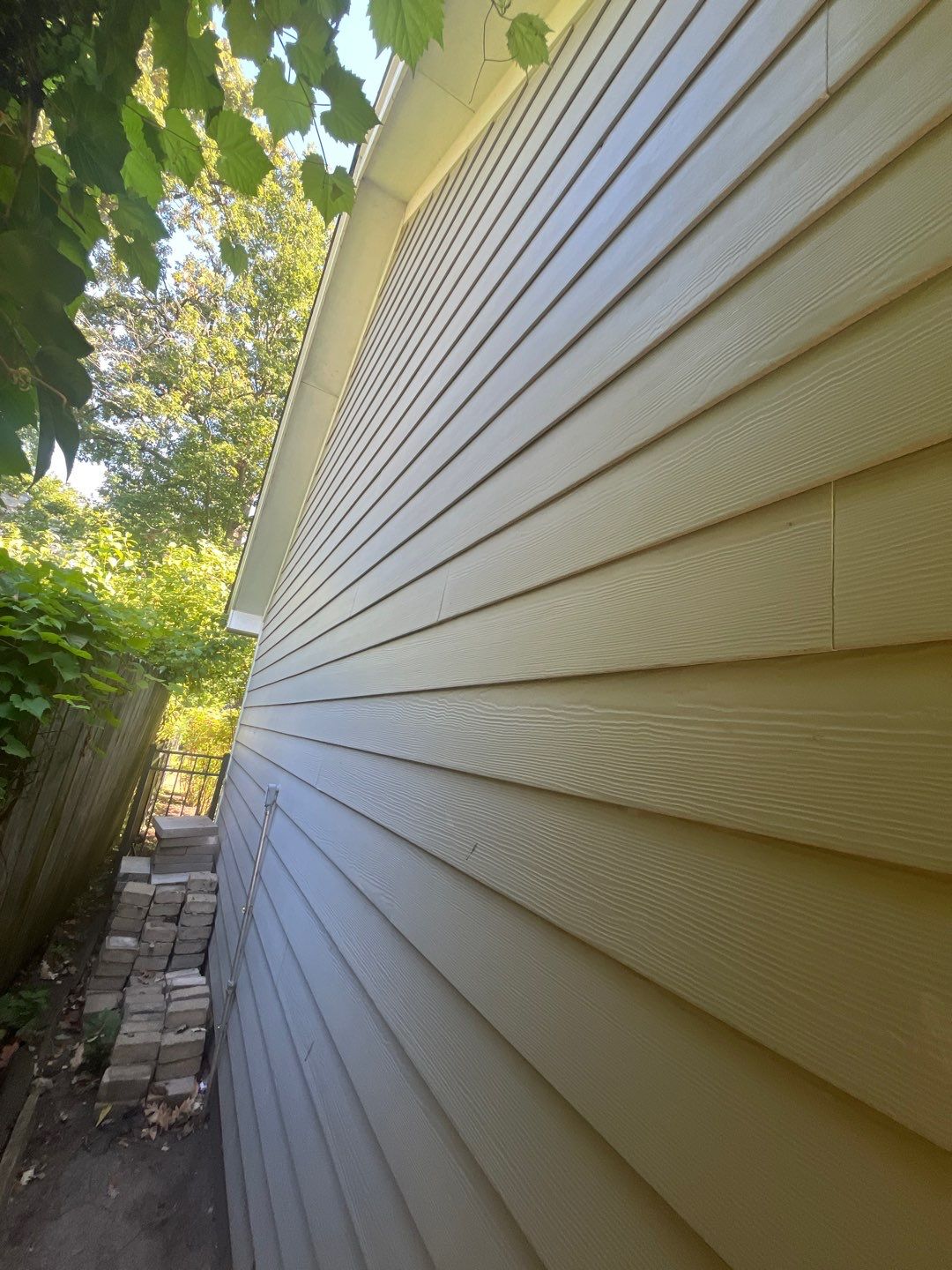 Hardie Board House & Detached Garage Soft Washing by Northern Power Washing LLC.