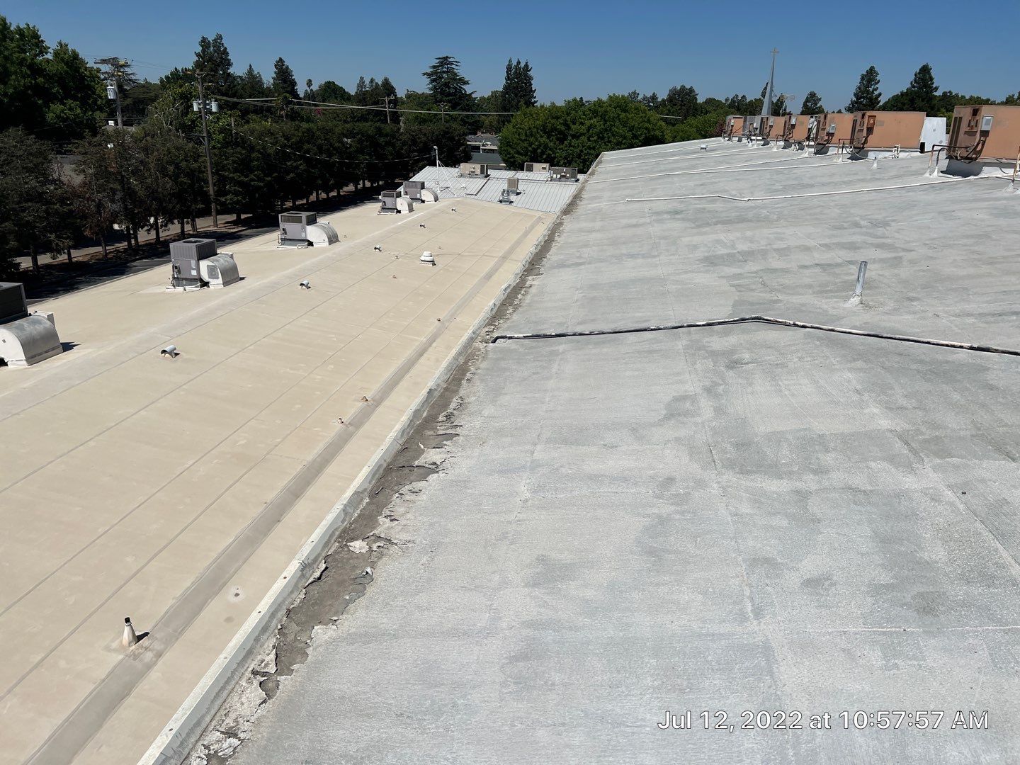 MR Roofing system using Benchmark/PUMA XL coatings over TPO single-ply roofing by Straight Edge Roofing Inc