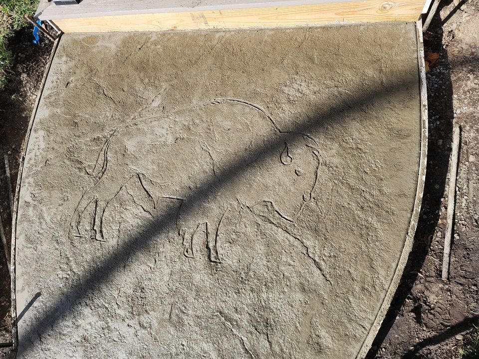 Exterior Renovations- Siding, Stamped Concrete, Porch, and Railings by Ivy Lea Construction