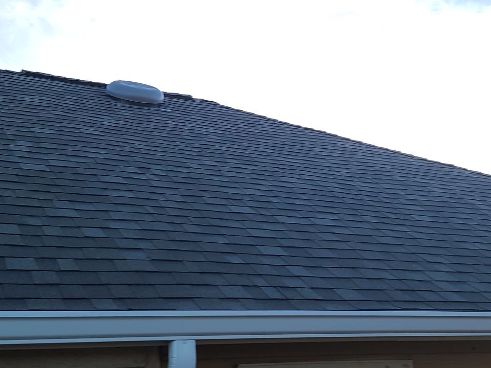 Hail Damage Restoration for Austin Two-Story Residential Home by Caliber Restoration LLC