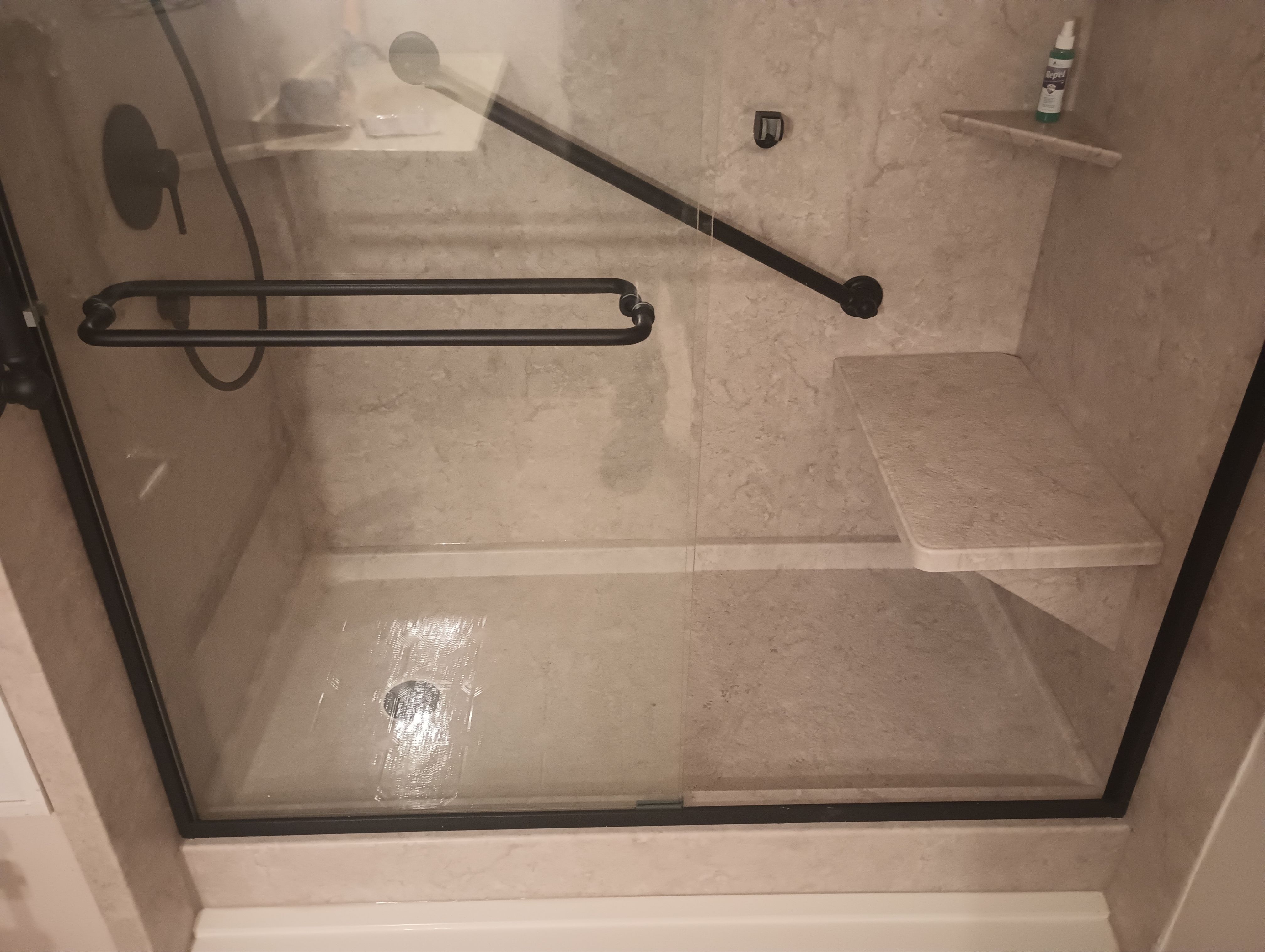 Tub to Shower Conversion using BCI Acrylic Shower System by Secure Construction Company Inc