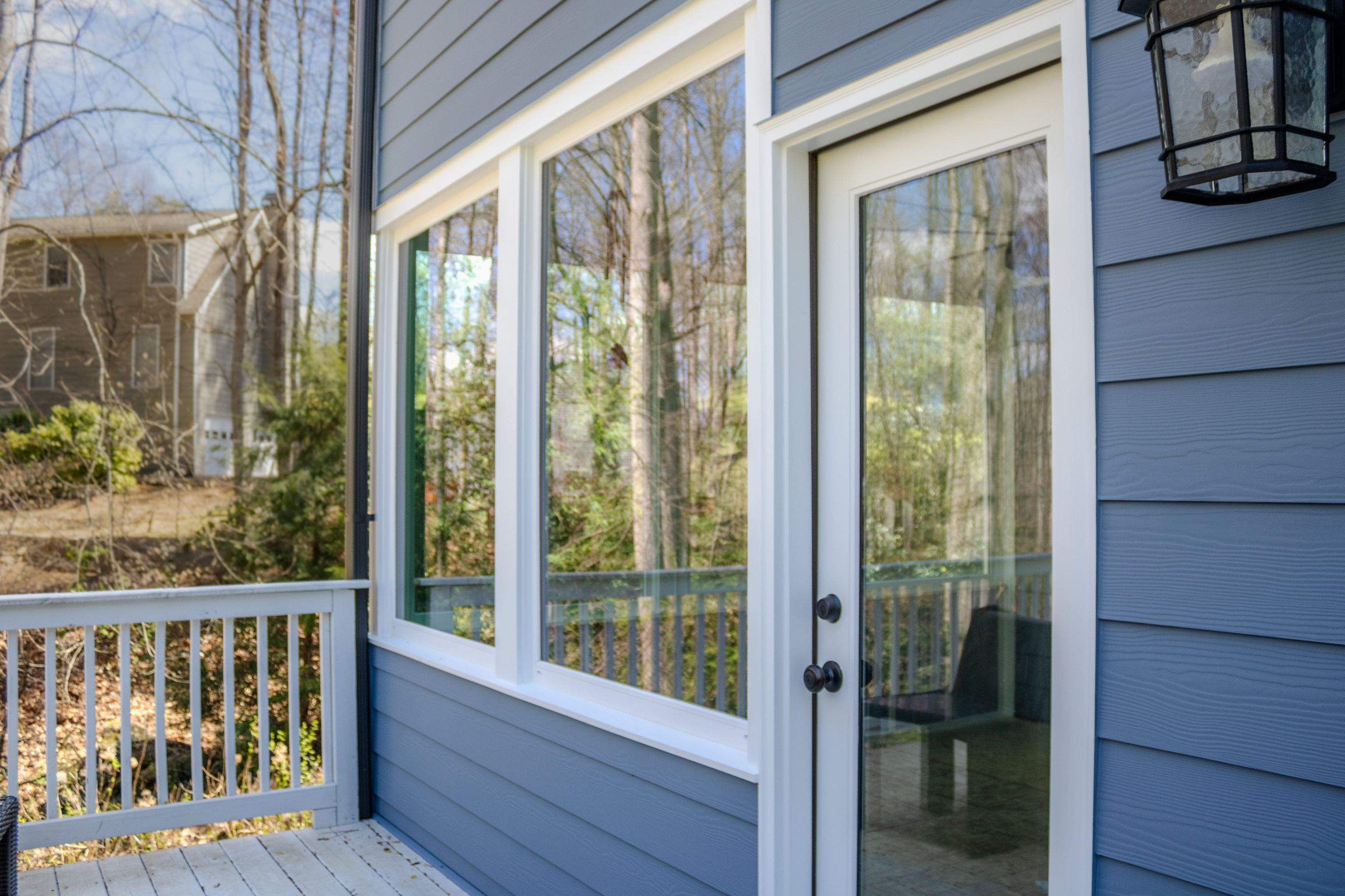 Marietta, GA Full Siding Replacement, 30+ Window Replacements, Screened-In Porch to Sunroom Conversion, Gutter Replacement, and Exterior Painting by Nelson Exteriors