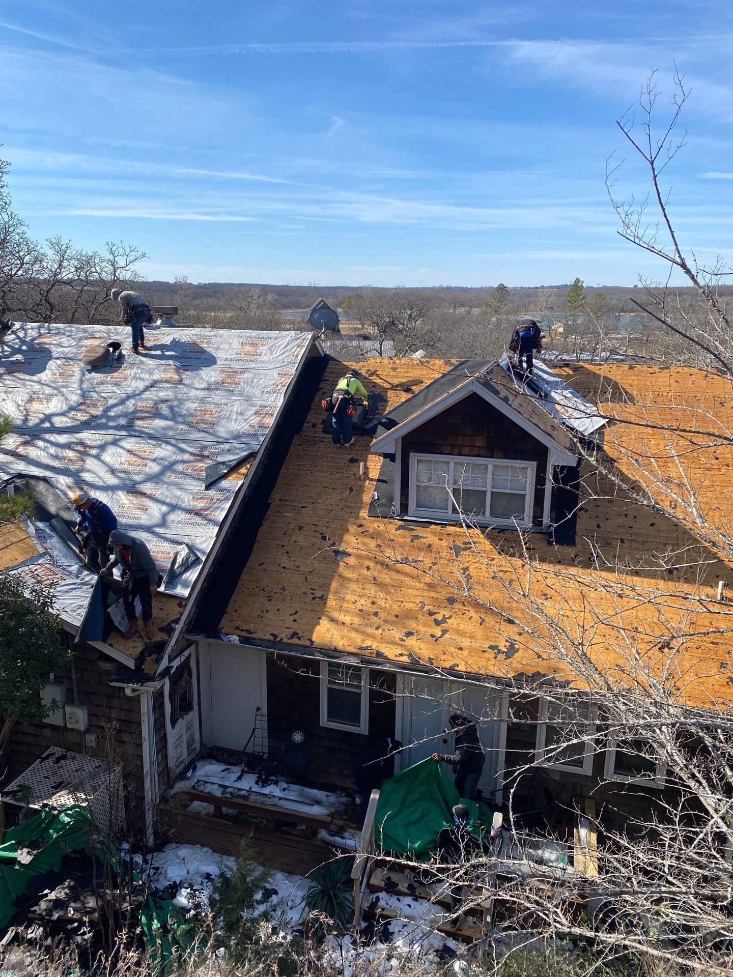 Roof Replacement on a private lake near Ardmore by BANA Roofing and Solar Supply