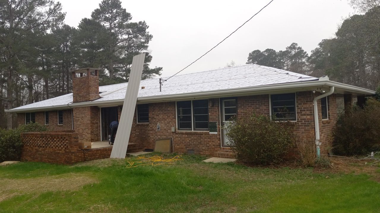 Bold Switch: From Shingles to Metal by Georgia Roof Advisors