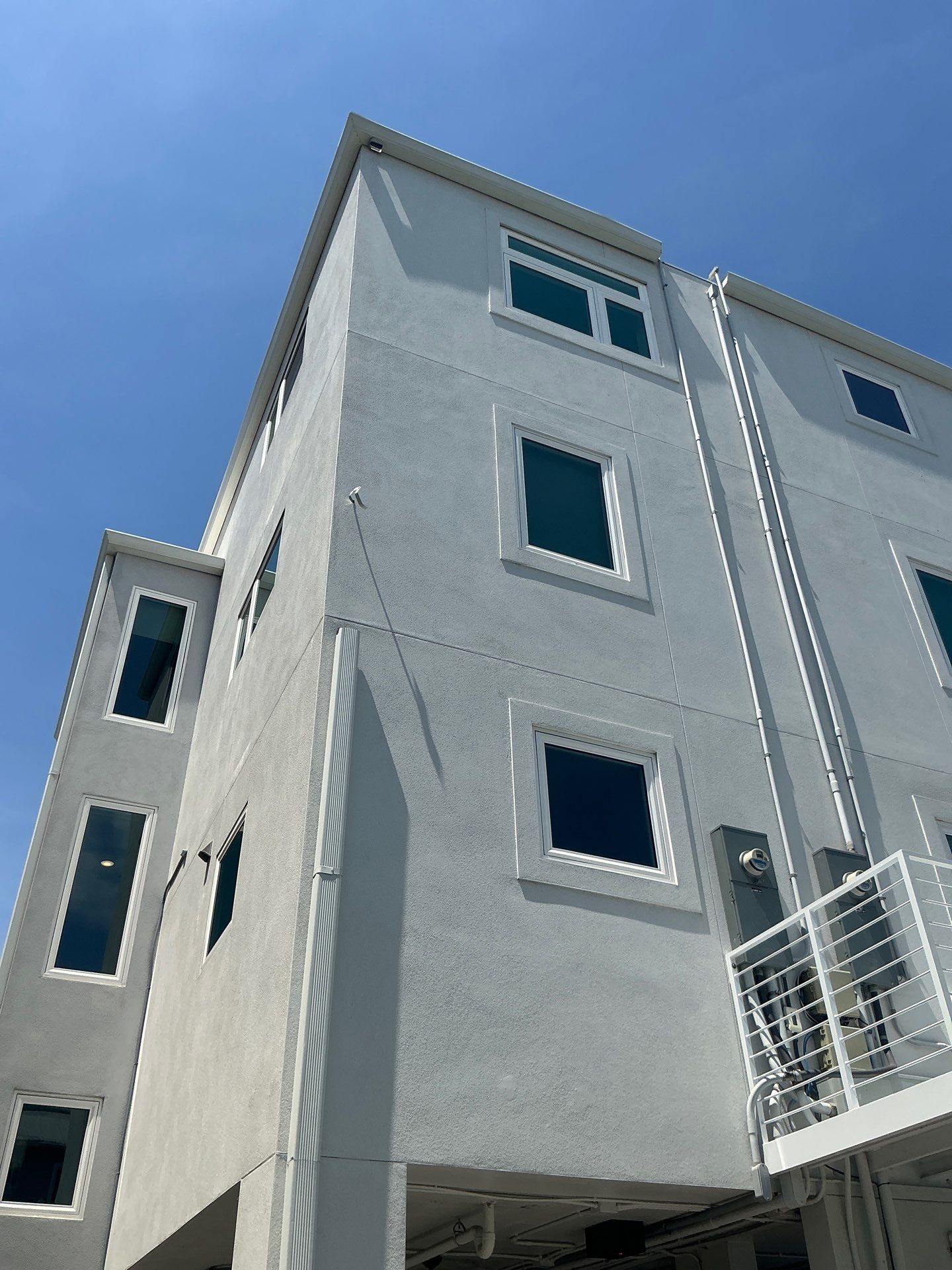 Seamless Gutters with Downspouts in Siesta Key FL by Gutter Professors