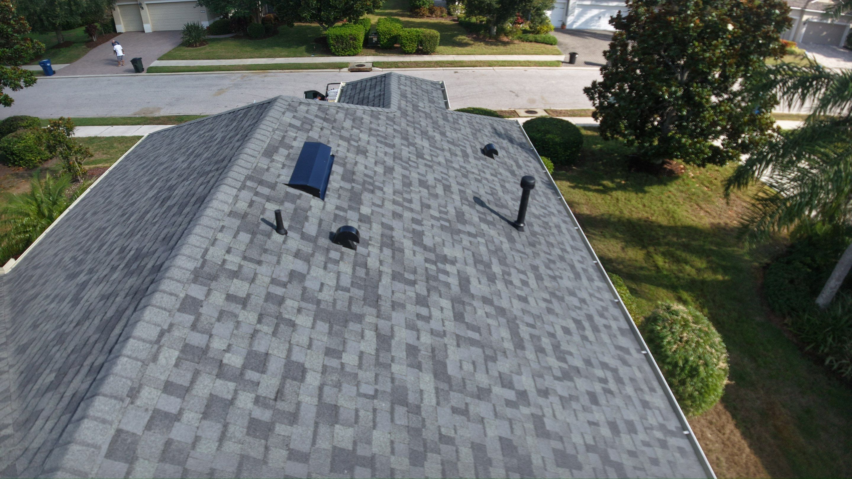 Residential Roof Installation With Estate Grey Architectural Shingles in Bradenton by Trinity Restoration and Roofing LLC