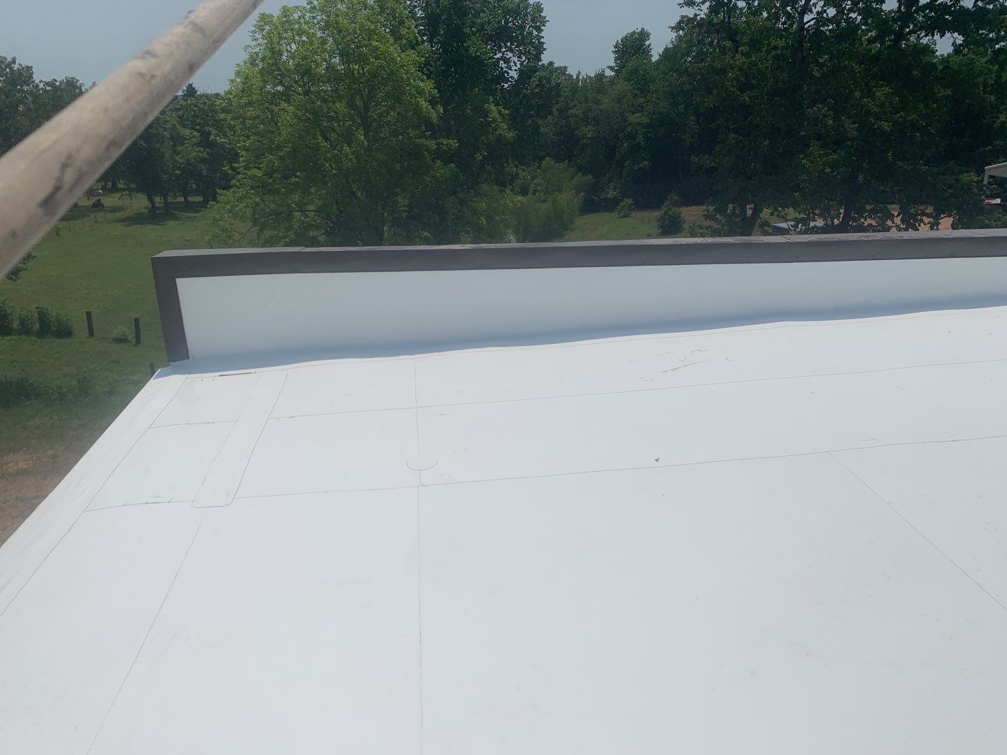 Commercial Roofing Installation using 50 mil PVC by Hostetler Roofing