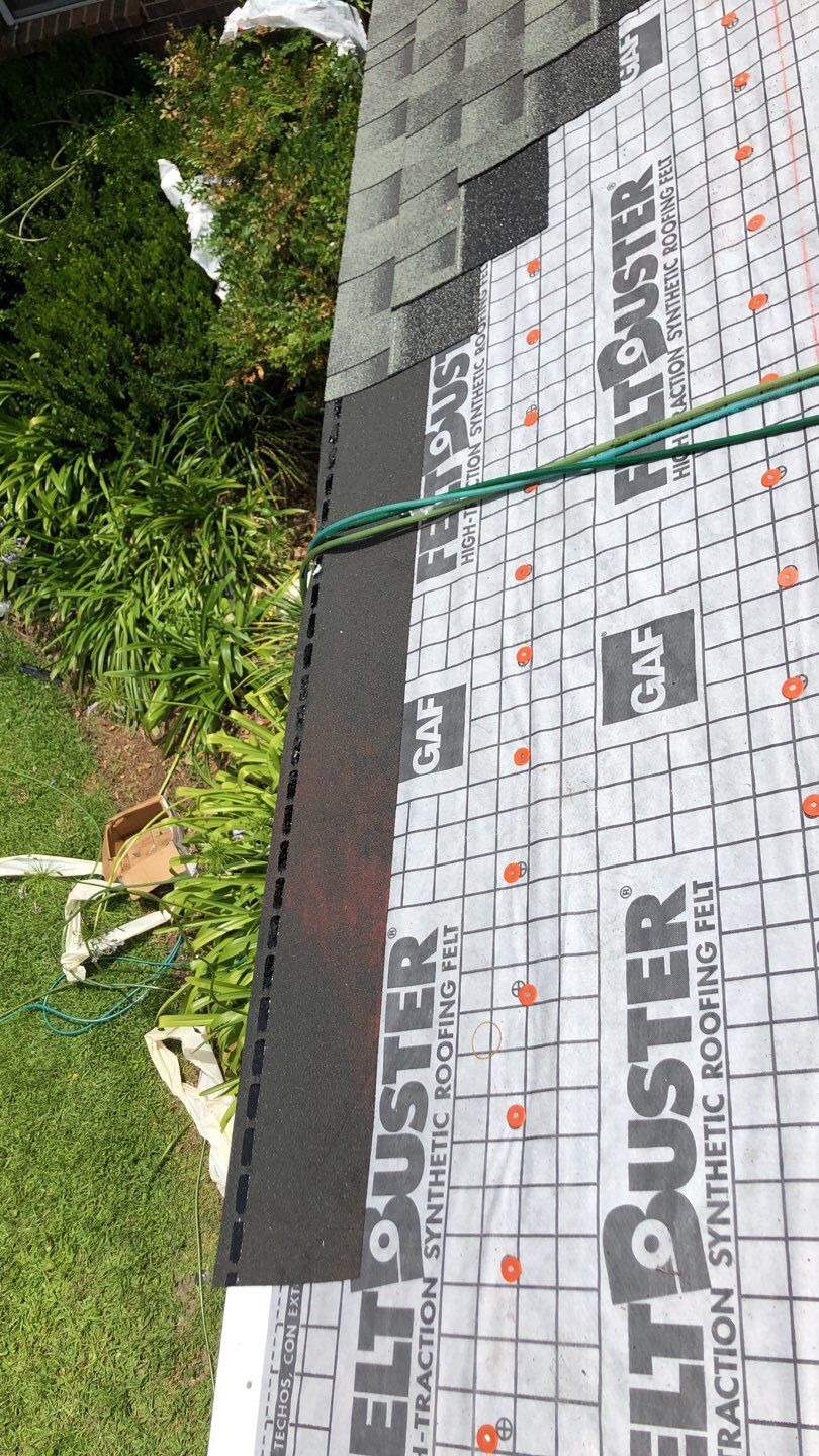 Residential Roofing Installation using Roof Replacement by American Roofing & Construction LLC