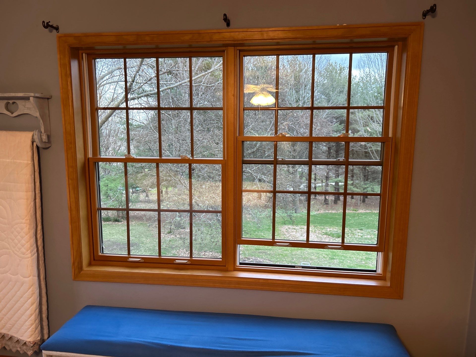 Pella Window installation using Pella Lifestyle wood/Aluminum window by United Windows and Siding LLC