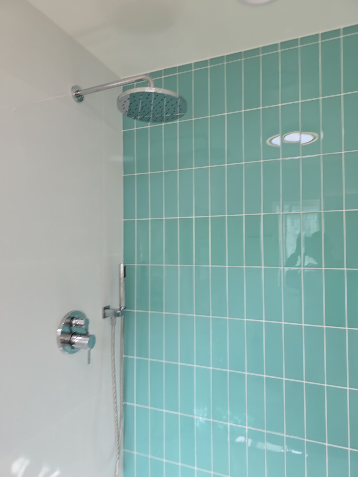 Scope of Work: Installation of Shower, Toilet, Sink, Fixtures, Pipes, and Seals by Us Plumbing