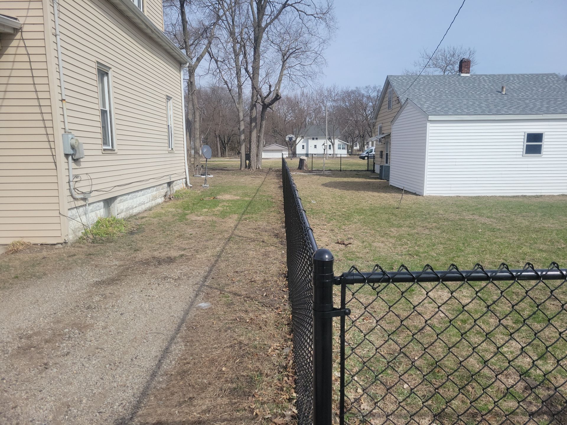 Black Chain Link Fence and Gate Installation in Waterloo by Perfect Picket Fence and Stain