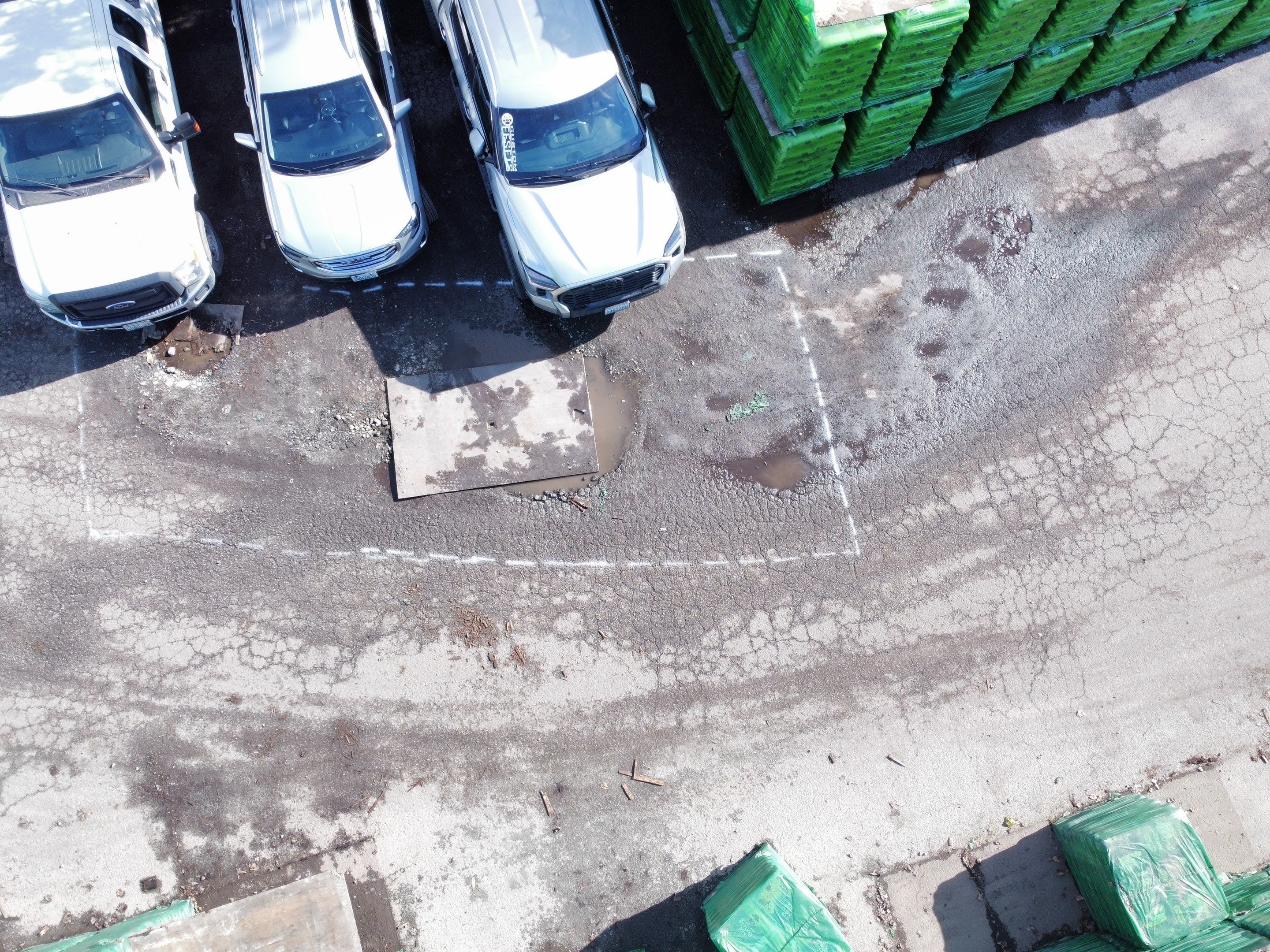 Scott's Miracle Grow | Asphalt Driveway Repair  by Jireh Asphalt & Concrete Inc 