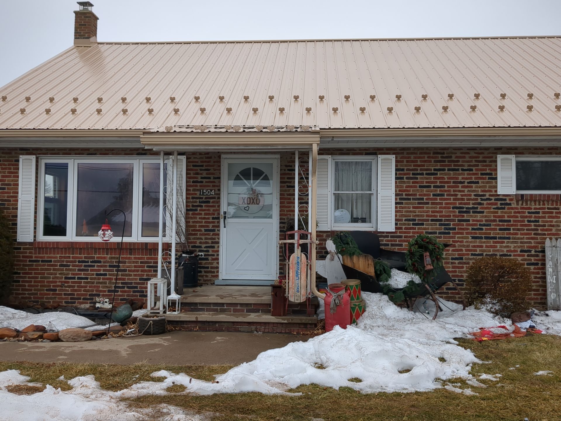 Tan Metal Roof and Gutter Replacement for Valley View Home by Esh Builders