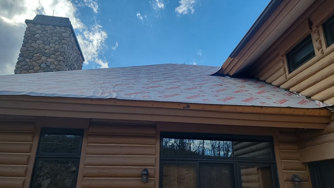 Standing Seam Metal Roof Replacement After Snow Damage by ASAP Roofing & Restoration