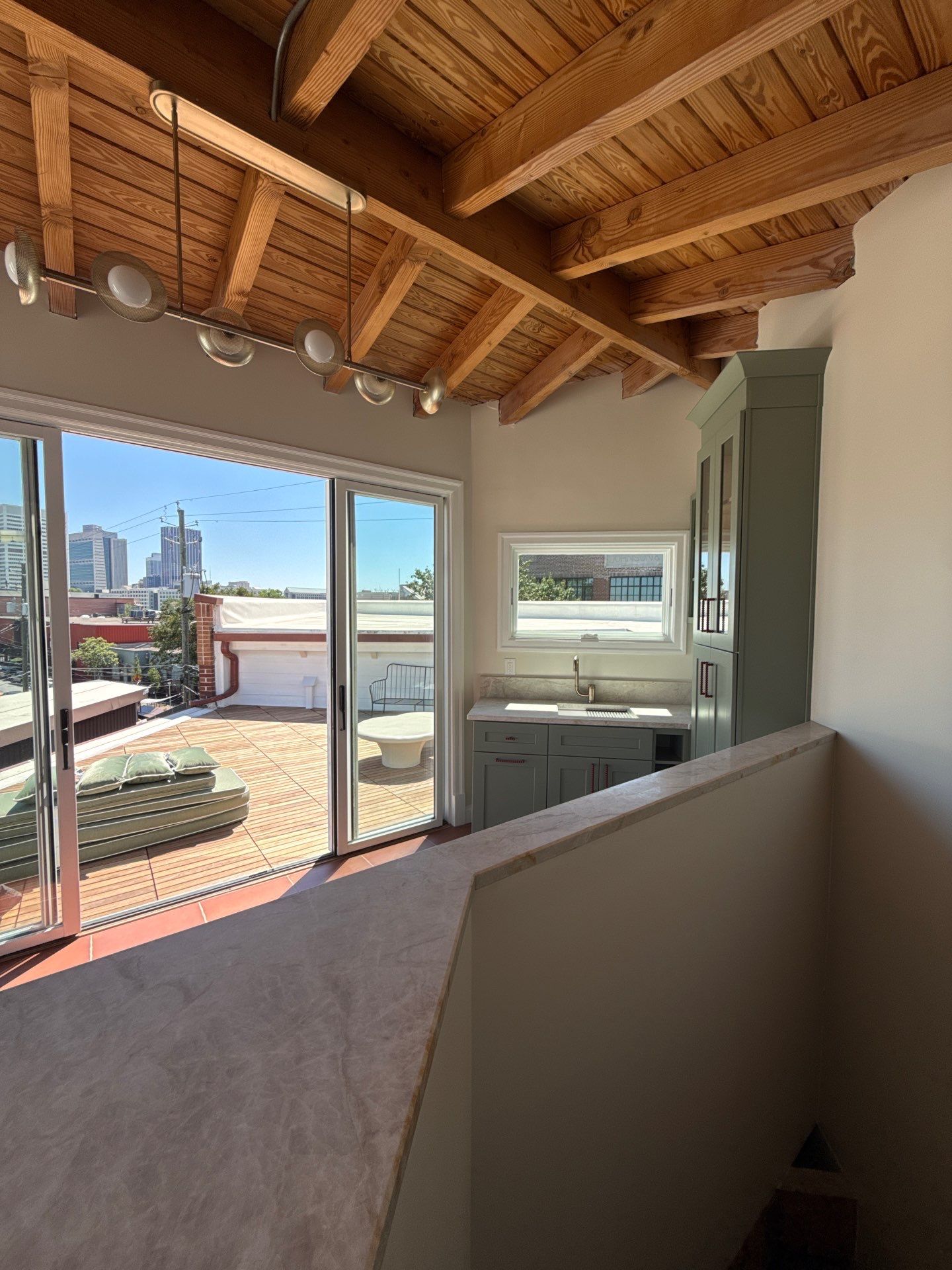 Atlanta Interior Renovation Featuring Rooftop Terrace and Custom Finishes by Swift Home Renovations
