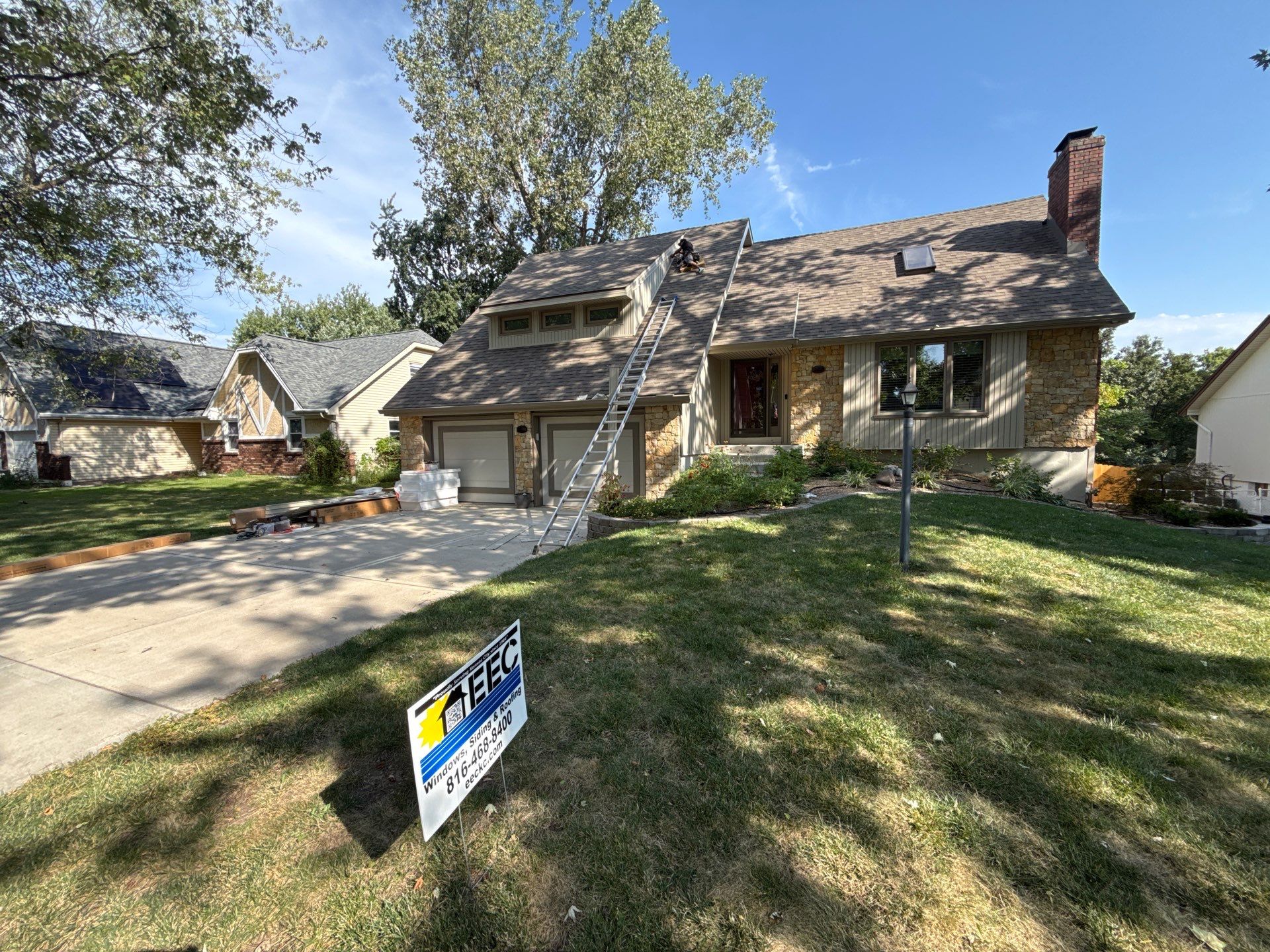 Comprehensive Kansas City Exterior Remodel Featuring Board And Batten Siding by EEC Windows, Siding & Roofing
