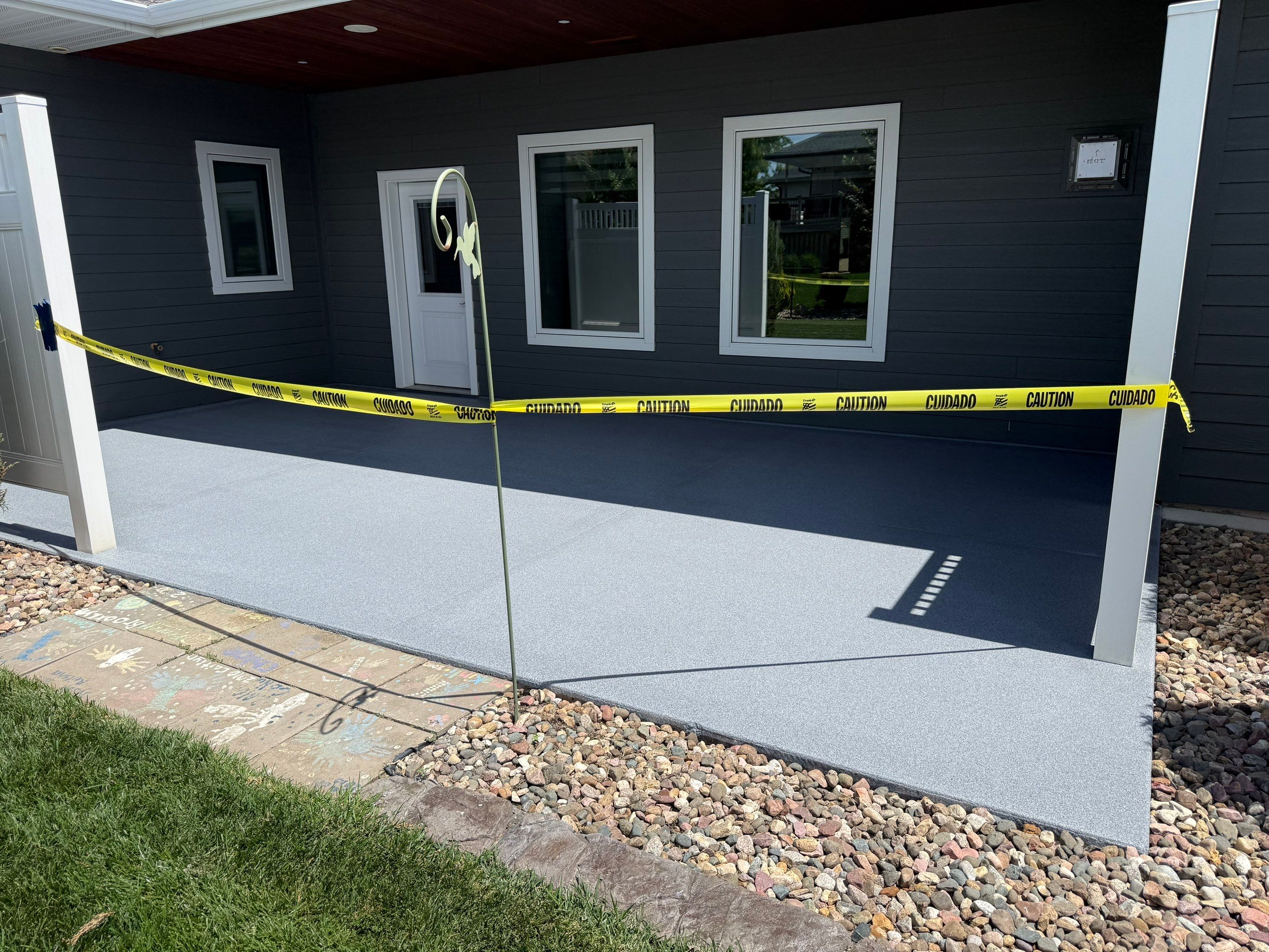 Polyurea Patio Floor Coating in Starry Evening for Sioux Falls Home by Select Painting, Coatings & Garage Cabinets