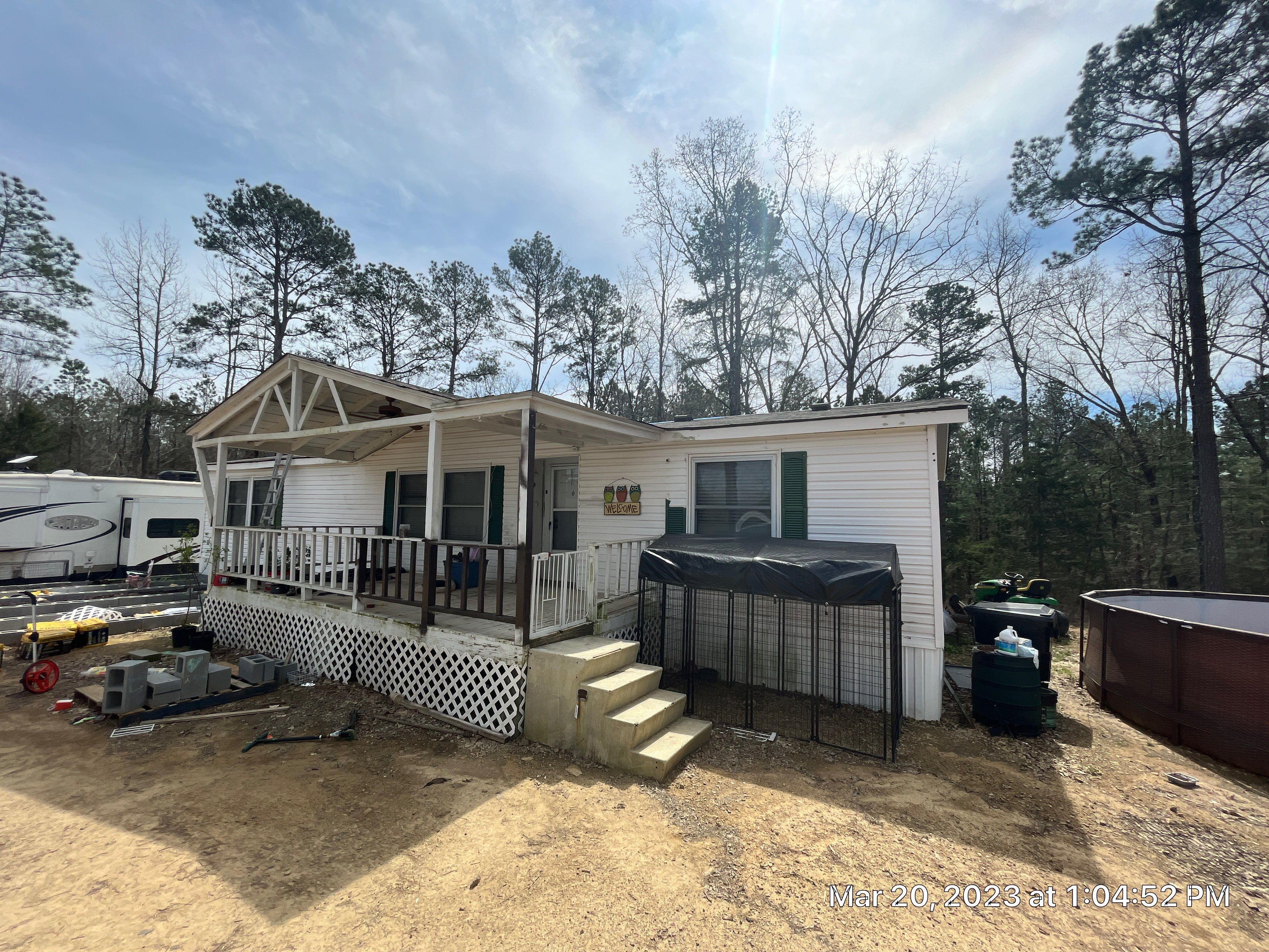 Residential Roofing Installation using 26 Gauge Colored Panels by Hostetler Roofing