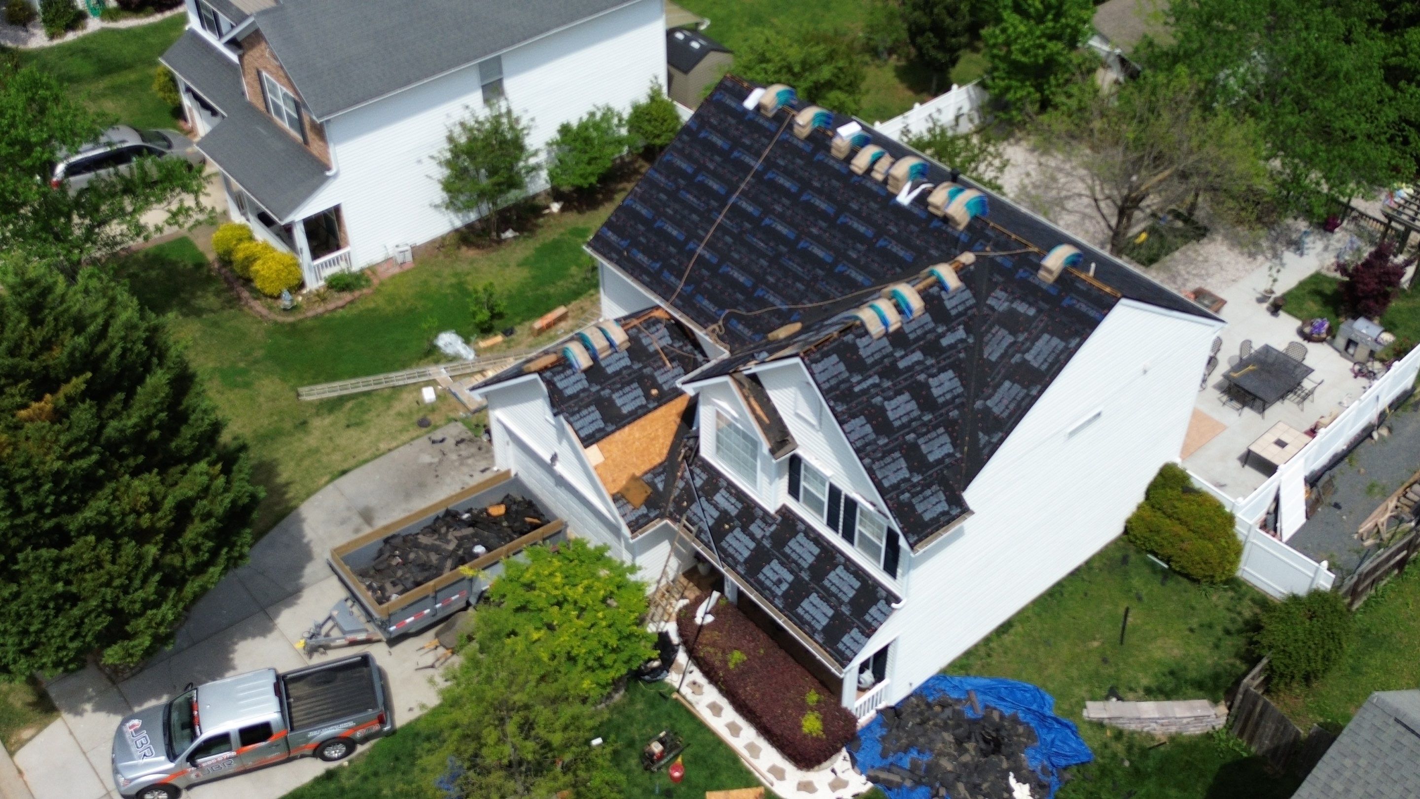 Roof and gutter replacement by hail damage by Just Brilliant Restoration JBR