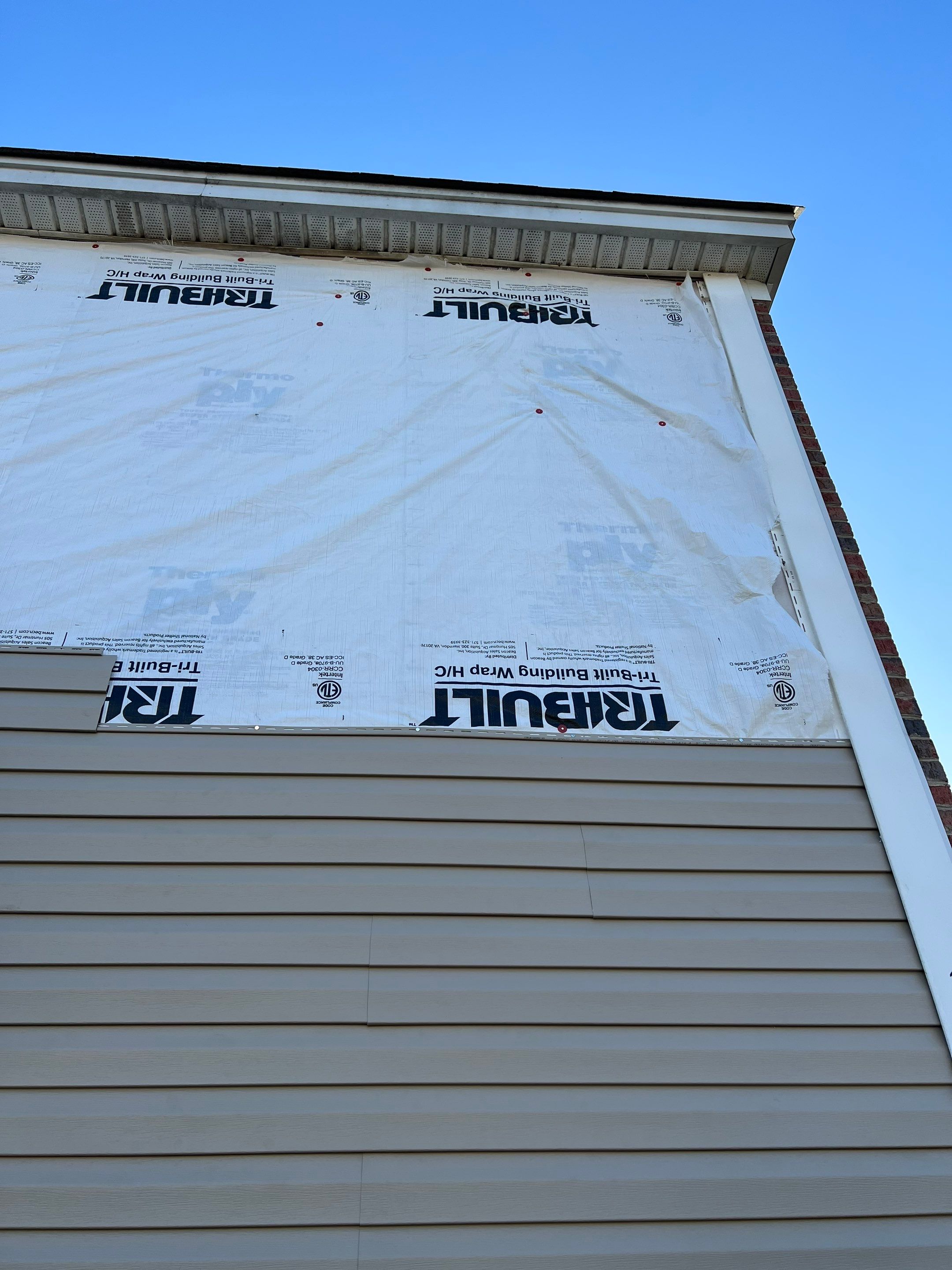 Replaced Wind Damaged Vinyl Siding by Midlands Roofing & Exteriors