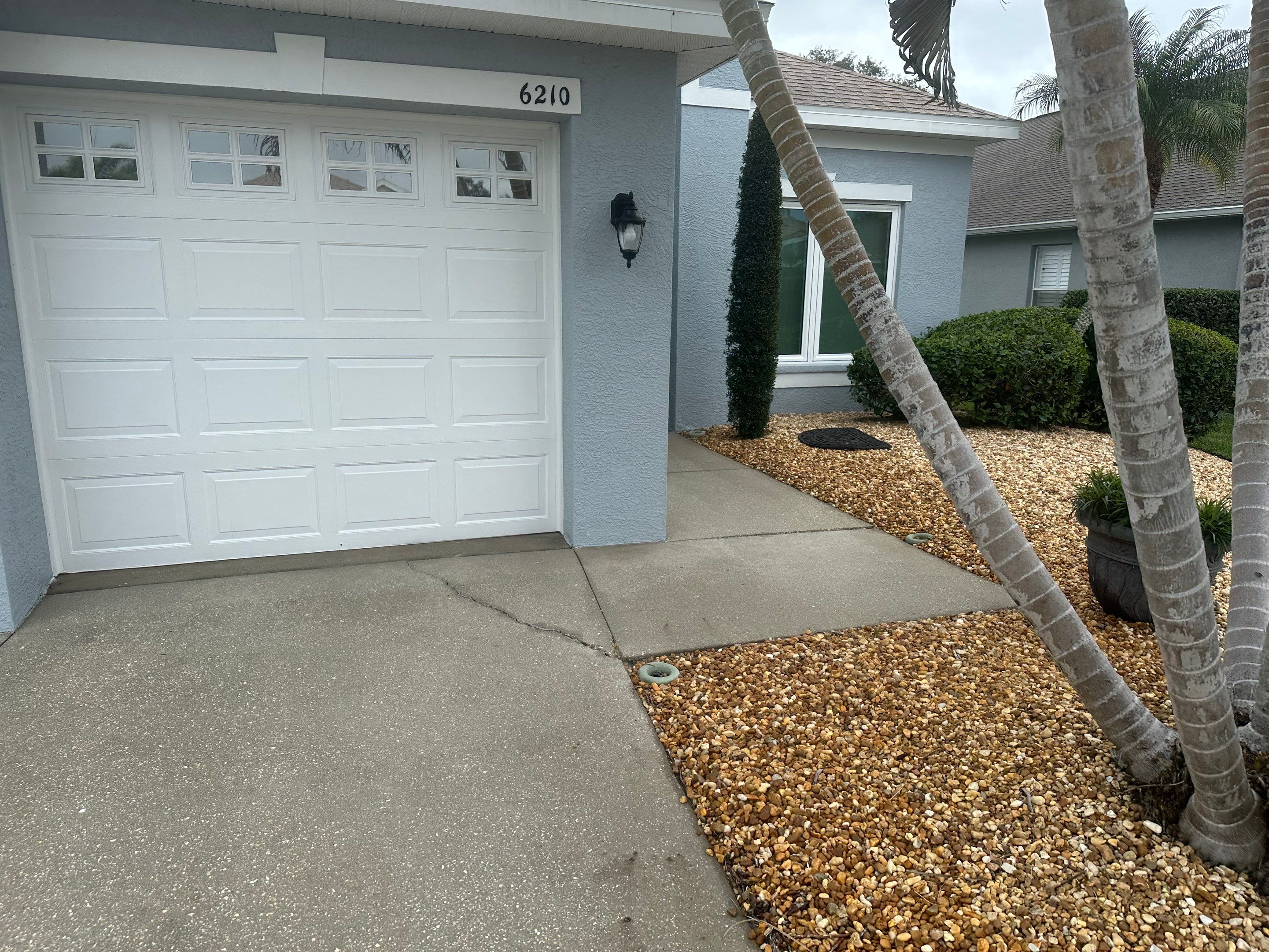 Concrete Driveway, Entryway & Street Curbing Cleaning in Fairways at Imperial Lakes, Palmetto, FL | Sunshine AquaWash by Sunshine AquaWash