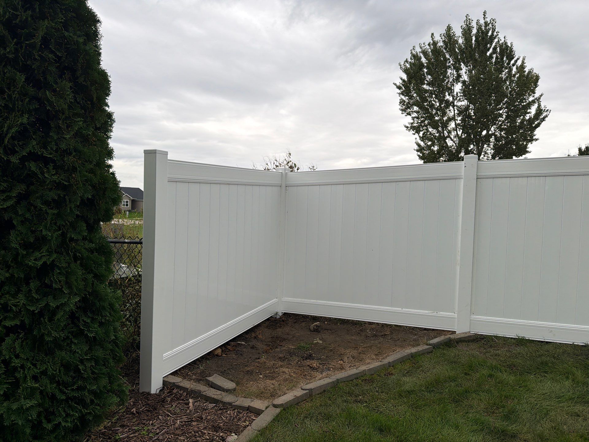 Residential Vinyl Privacy Fence Installation in Urbana by Perfect Picket Fence and Stain