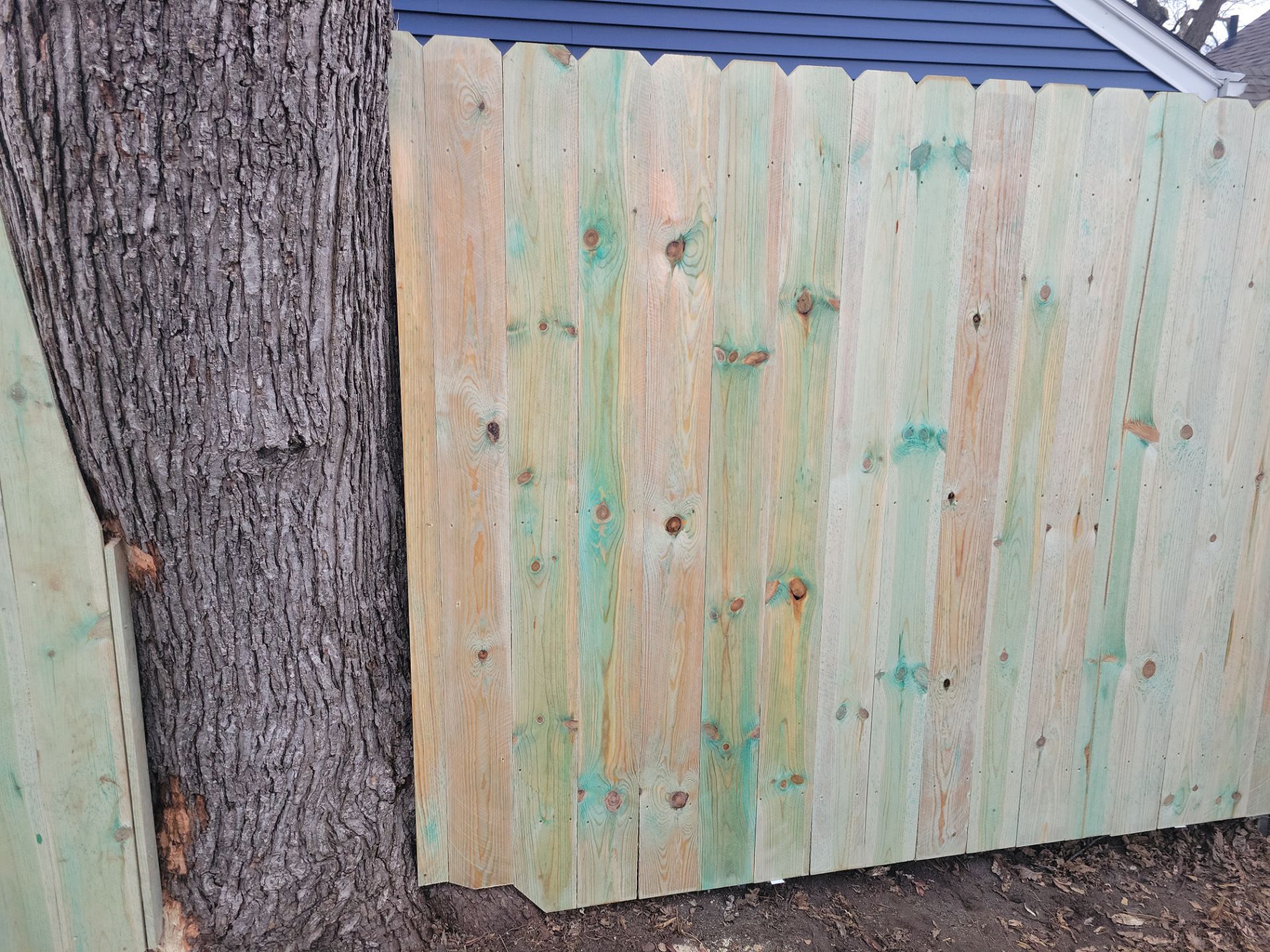 Custom Wood Privacy Fence and Gate Installation in Waterloo by Perfect Picket Fence and Stain