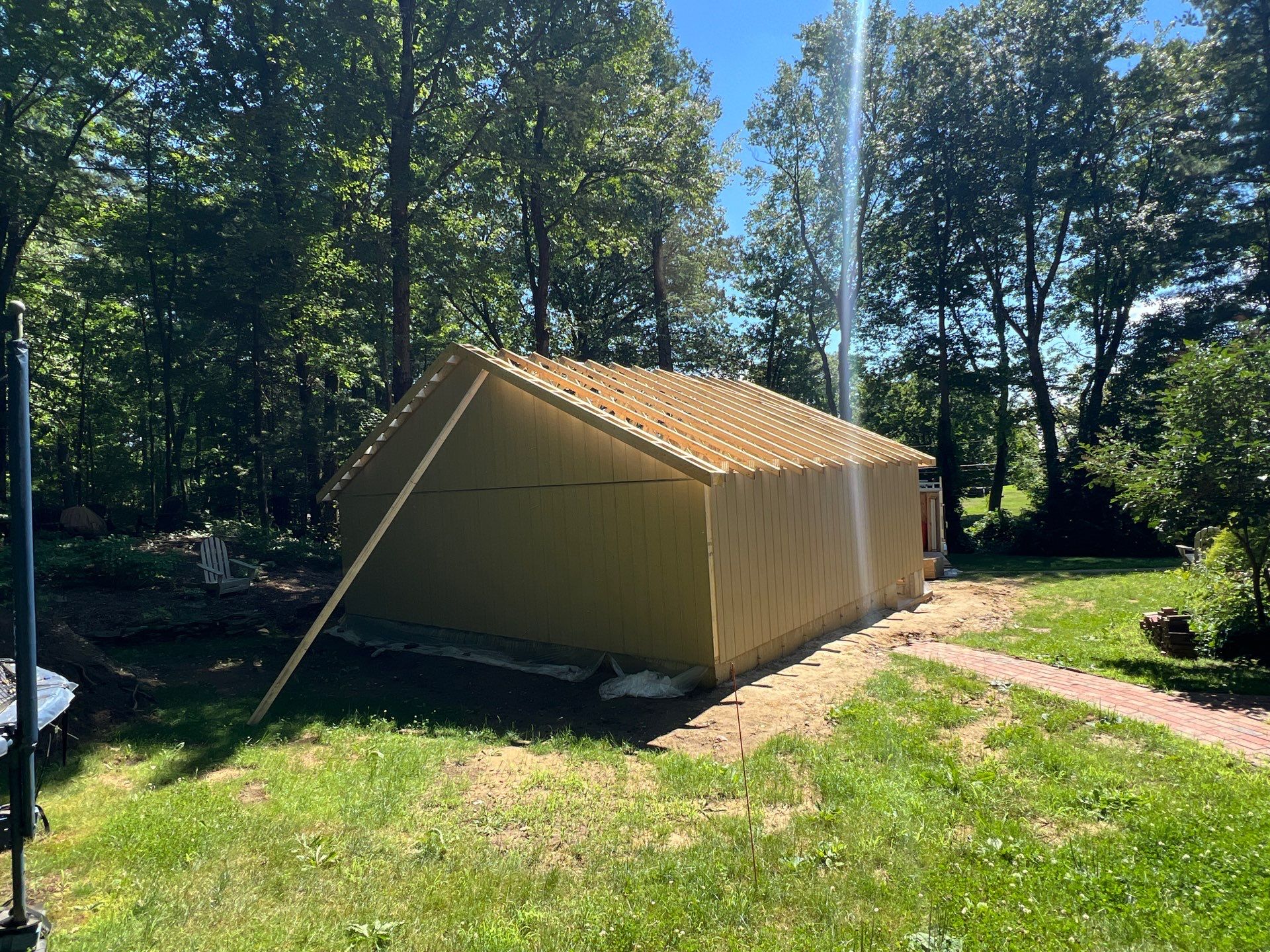 Garage using LP SmartSide Panel Siding by Chagnon Building & Remodeling LLC