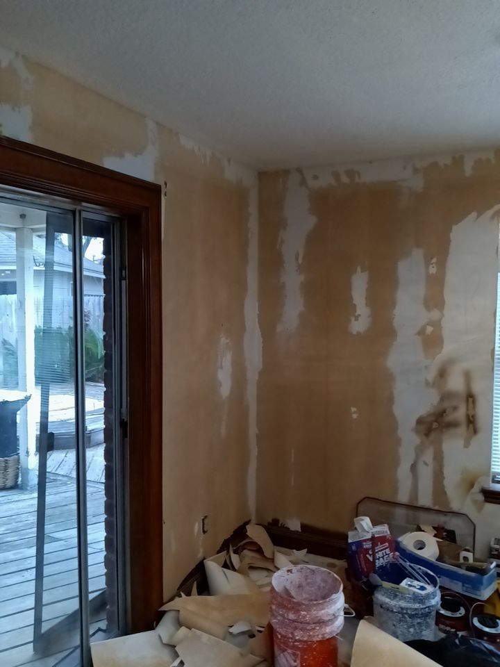 Interior and exterior painting project by Roof Concepts Construction