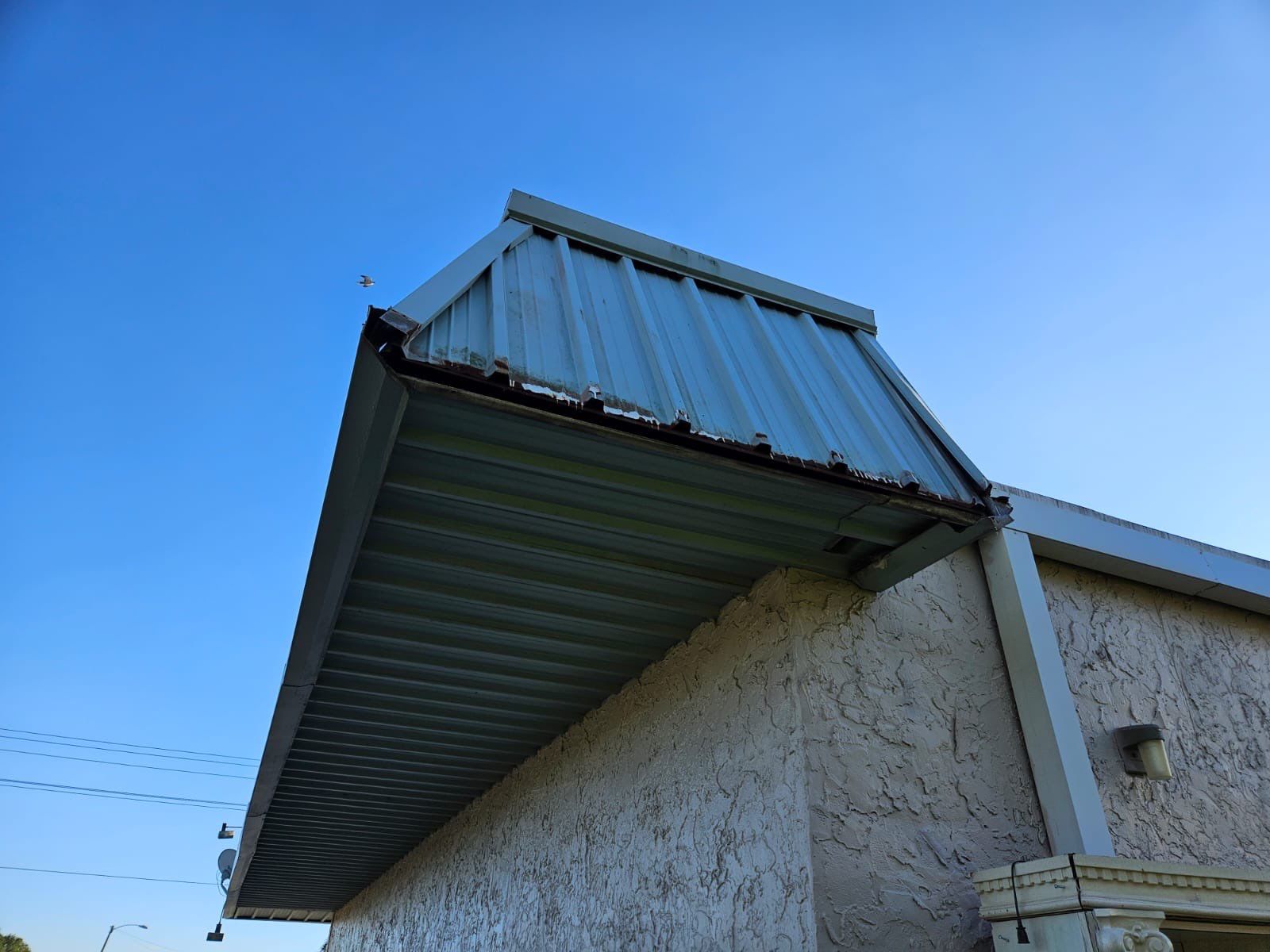Commercial Roofing Repair using TPO and Metal Decking by Four Peaks Roofing