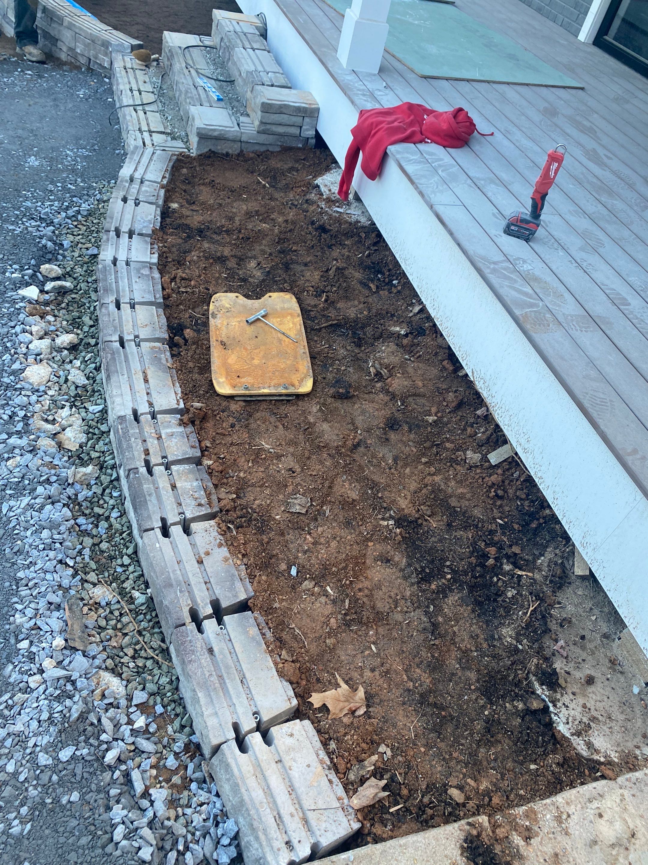 Retaining wall, walkway, small patio and landscape install by The Smet Companies, LLC