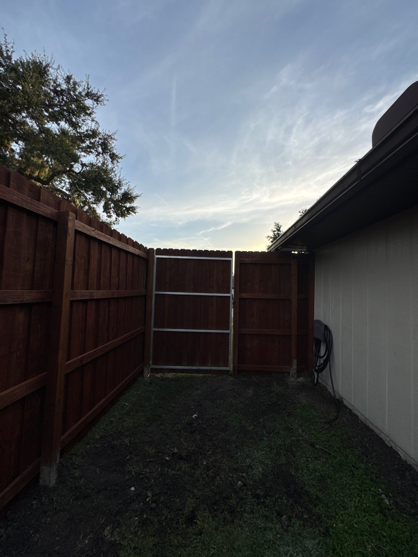 Wood Fence Installation using Pre-stained Pine Board On Board by Asap fence and gates, LLC