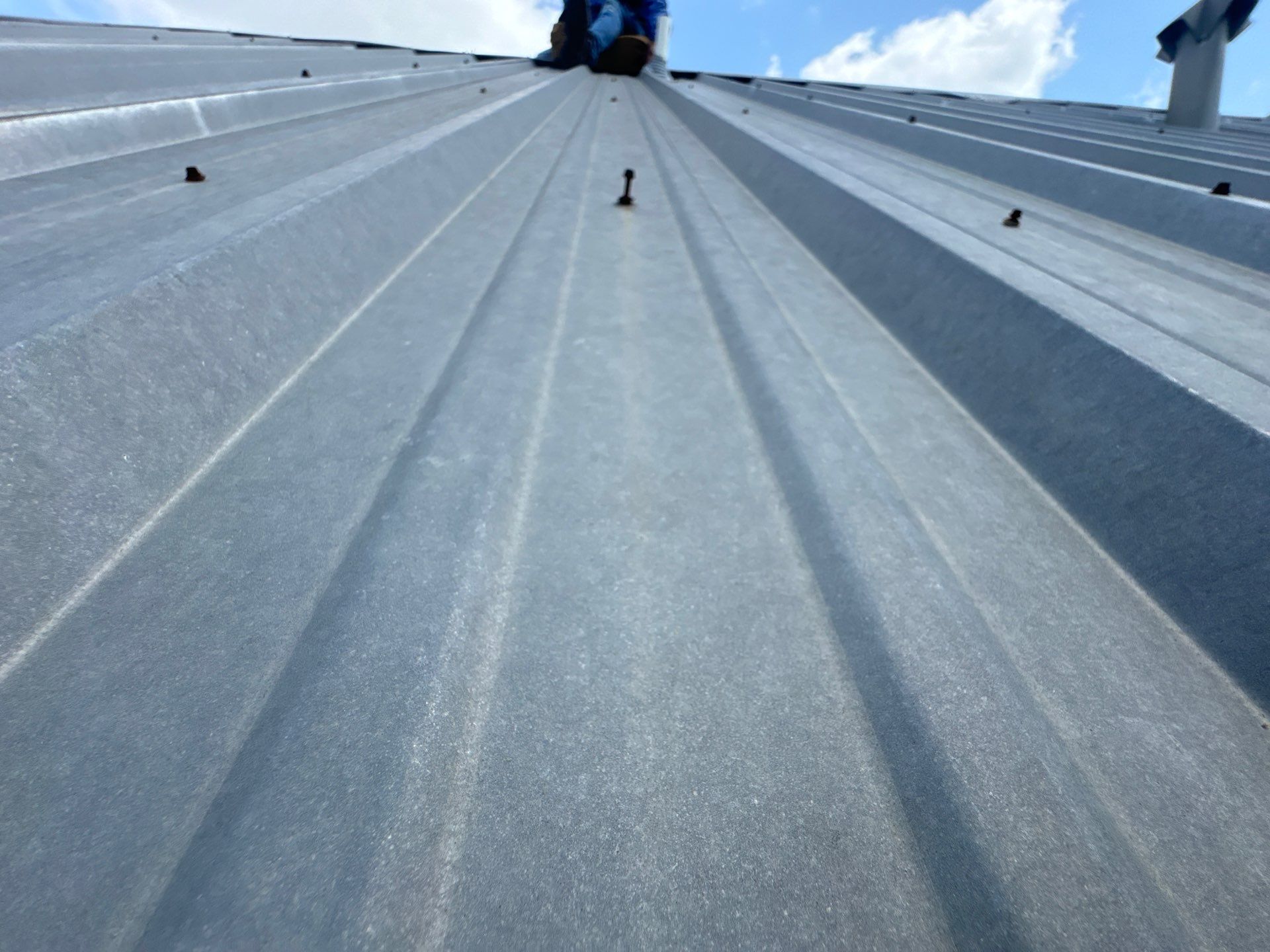 Metal Roof Leak Repair by Associates Roofing Unlimited