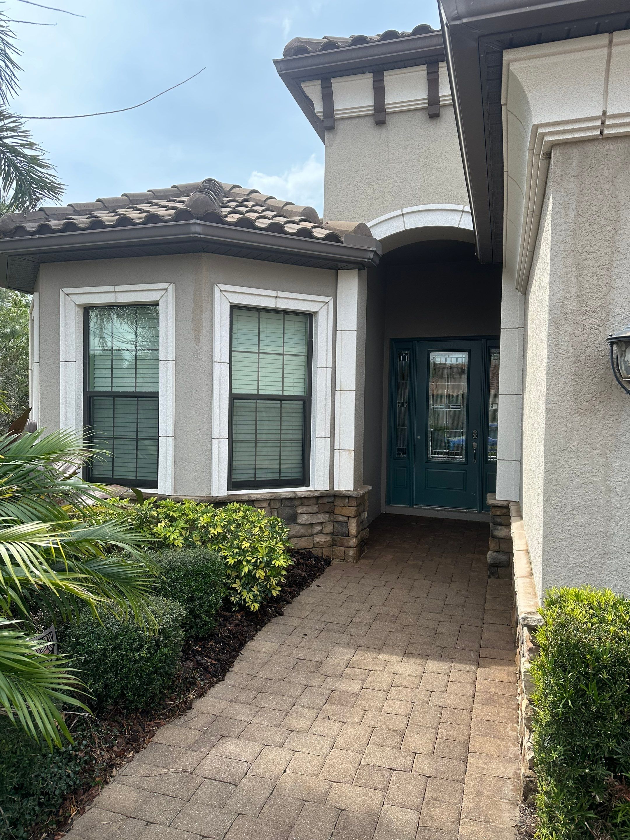Concrete Tile Roof, Paver Pool Deck, Screen Enclosure & Driveway Cleaning in Artisan Lakes Esplanade, Palmetto, FL | Sunshine AquaWash by Sunshine AquaWash