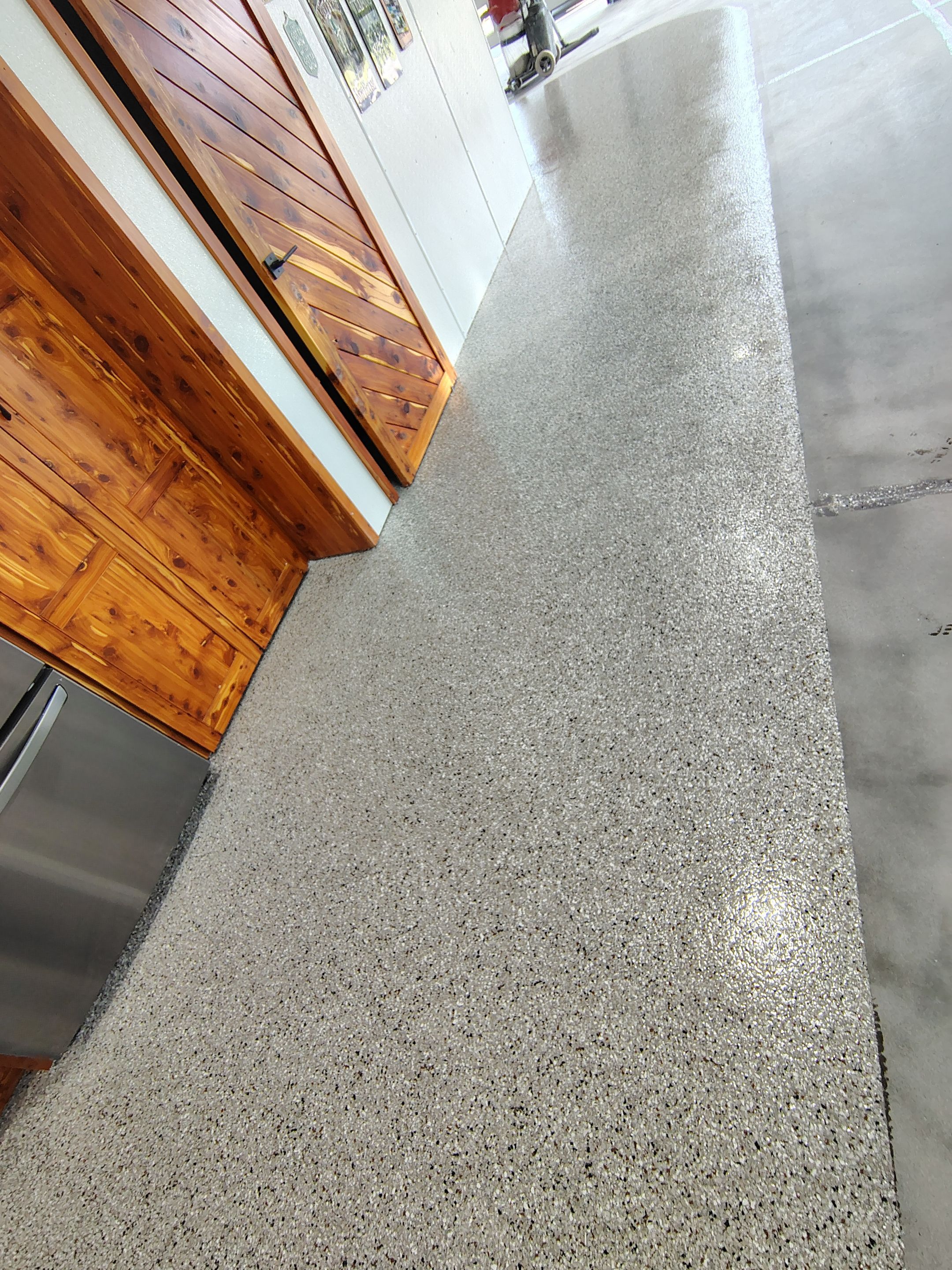 Multi-Stage Concrete Floor Coating for Egan Shop and RV Storage by Select Painting, Coatings & Garage Cabinets