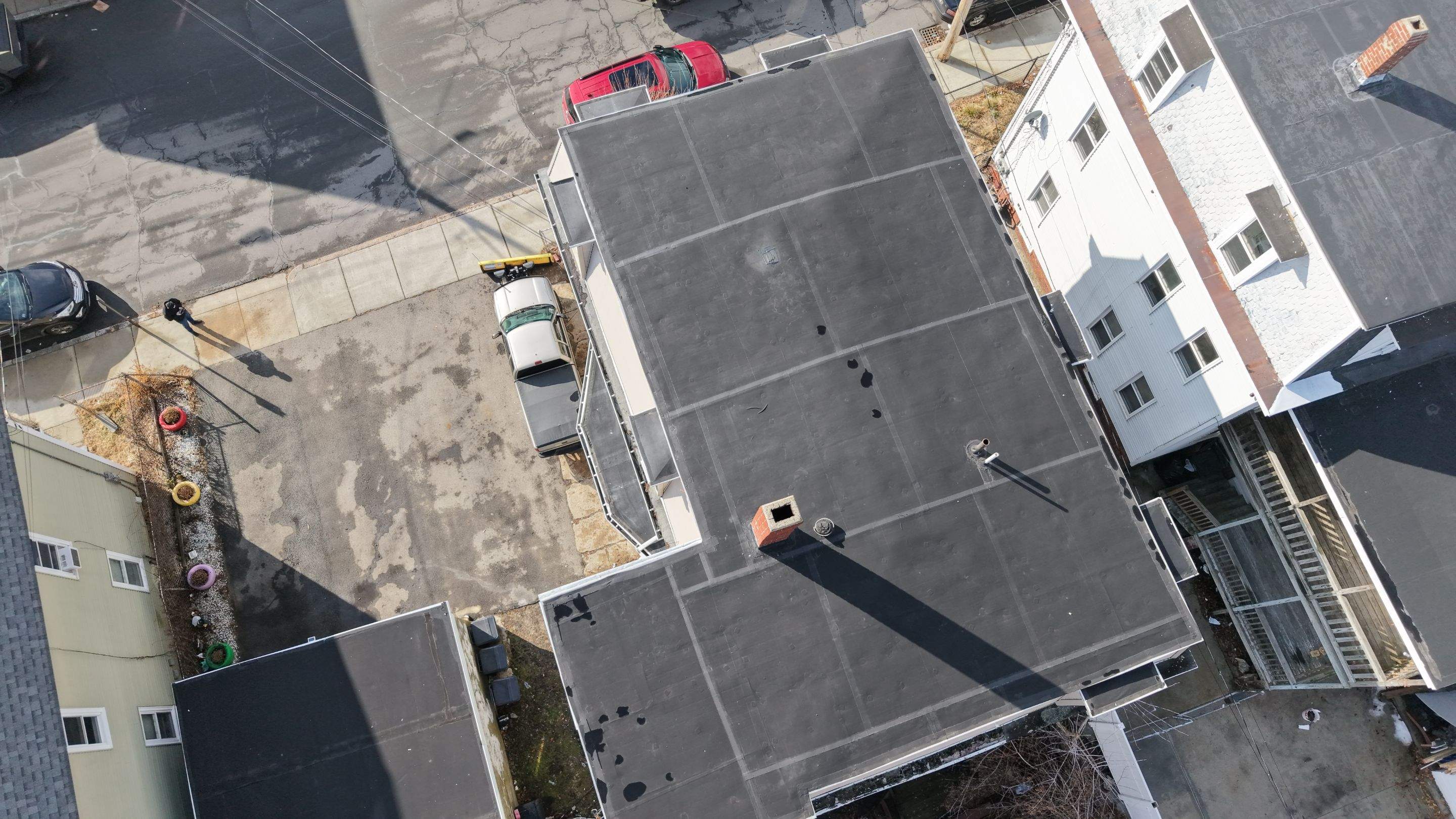 Gravel Roof Tear-Off & EPDM Rubber Roof Conversion in Haverhill, MA by JOHNNYS PRO
