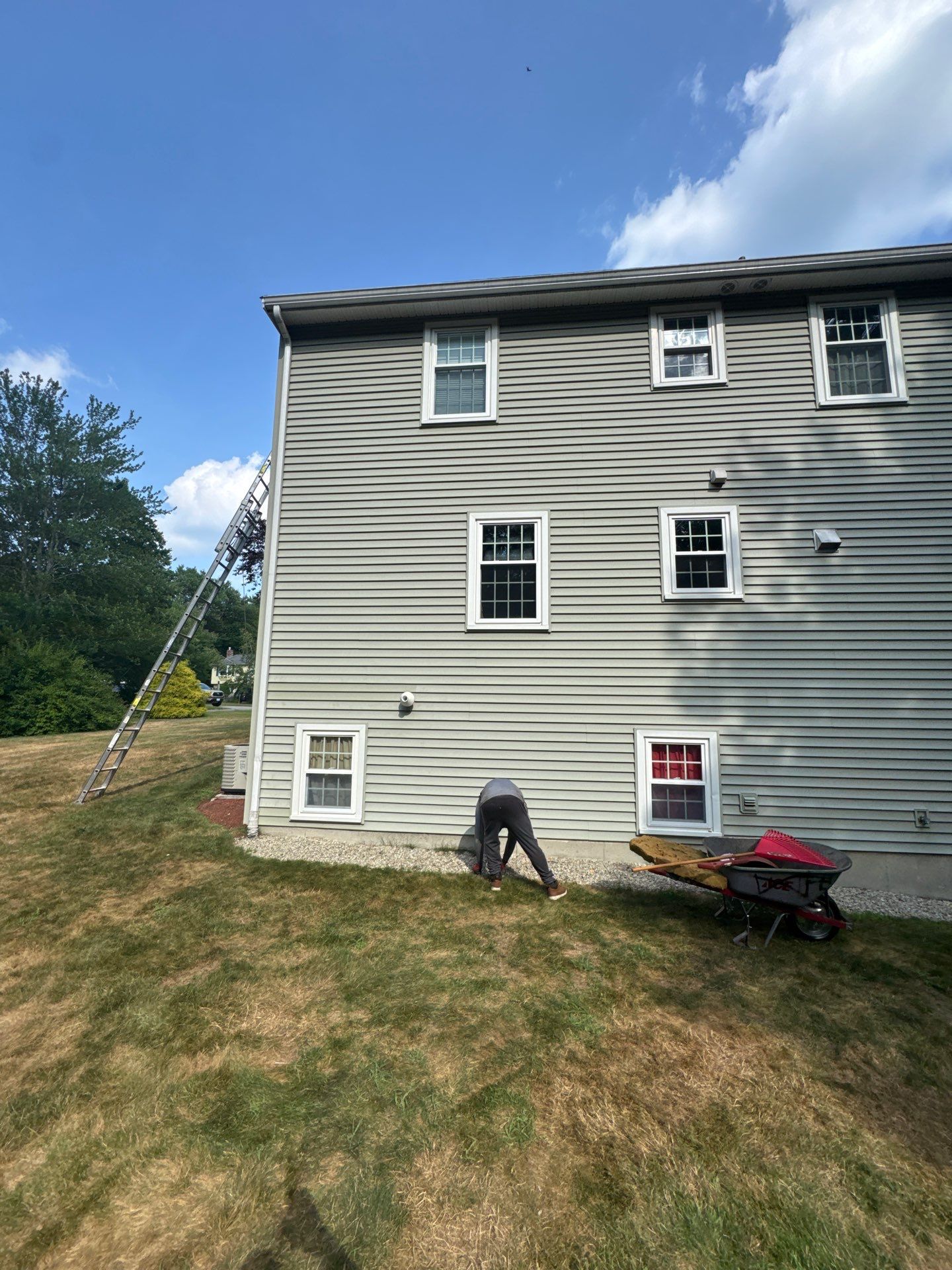 Complete Roof Replacement with Chimney Flashing, Gutter Guard System, and Vinyl Siding Repairs by Mighty Dog Roofing of Greater Middlesex County