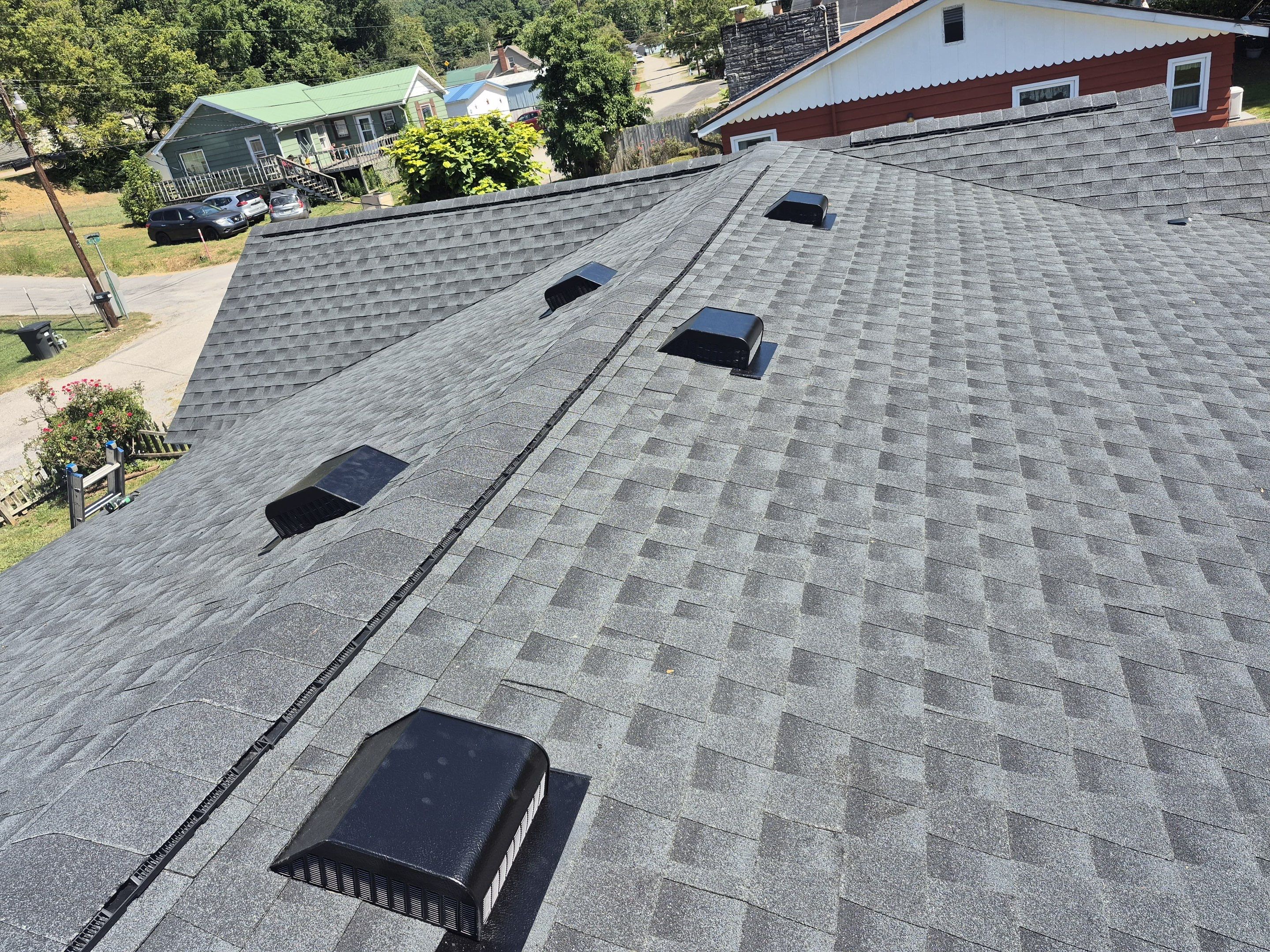 Residential Roofing Installation using GAF Timberline HDZ Charcoal by Rainstoppers Roofing