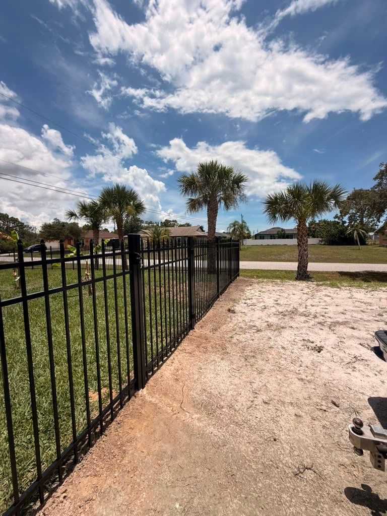 Black Aluminum Spear Top Picket Fence Installation in Englewood by True Fence LLC