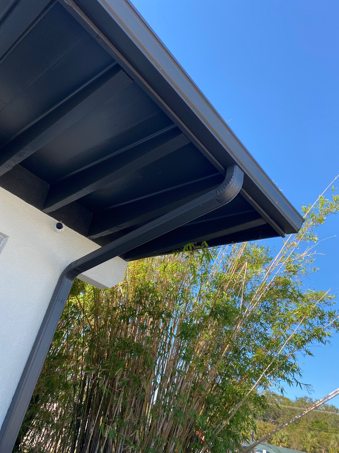 Black Seamless Gutters for Modern Homes in Sarasota FL by Gutter Professors