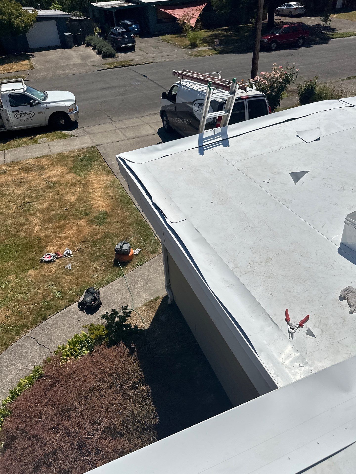 Residential Flat Roof Installation using GAF 60Mil TPO  by Orezona Building & Roofing Company, Inc.