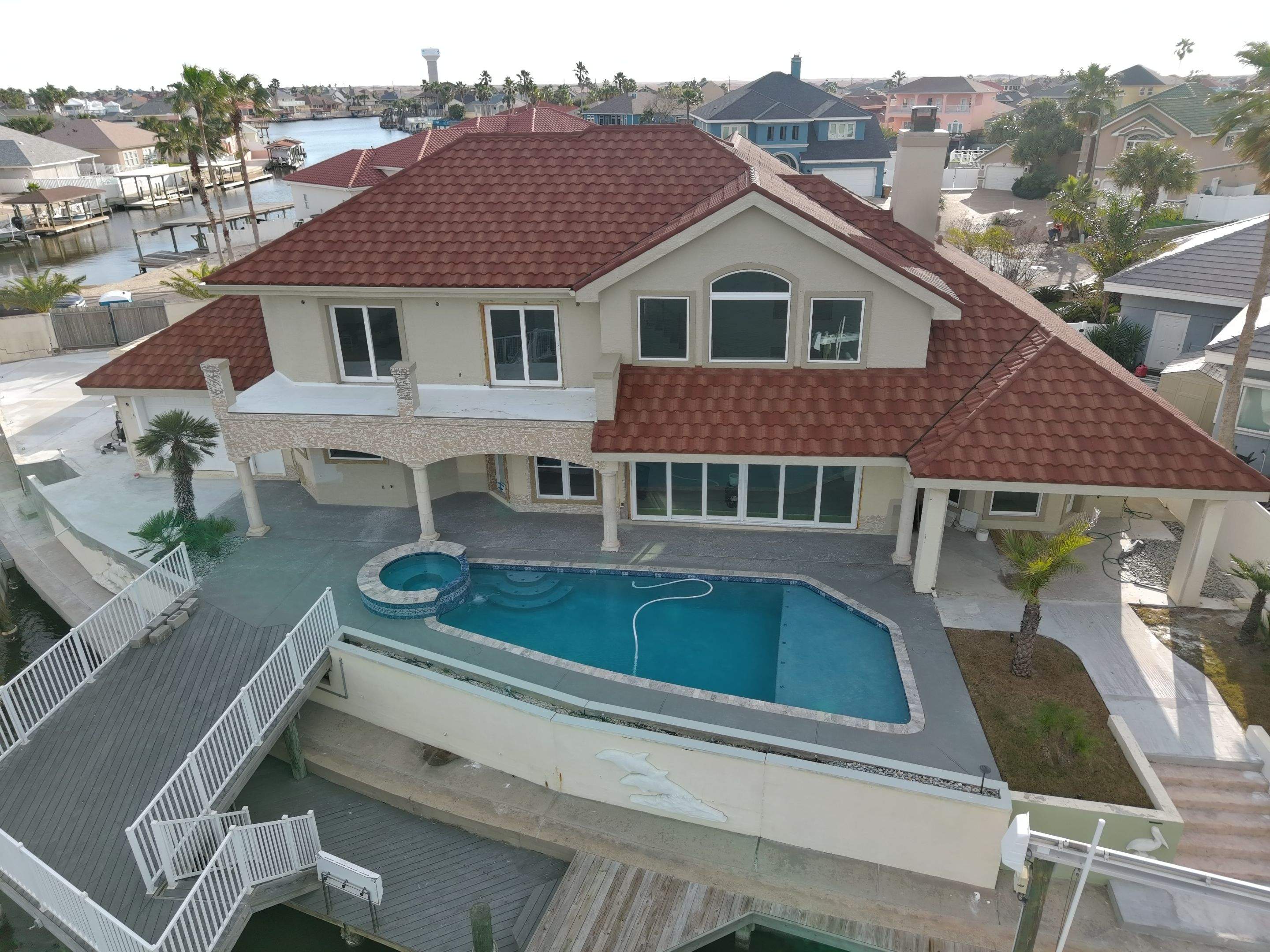 Isla Colon Mediterranean Makeover by Bayfront Roofing and Construction