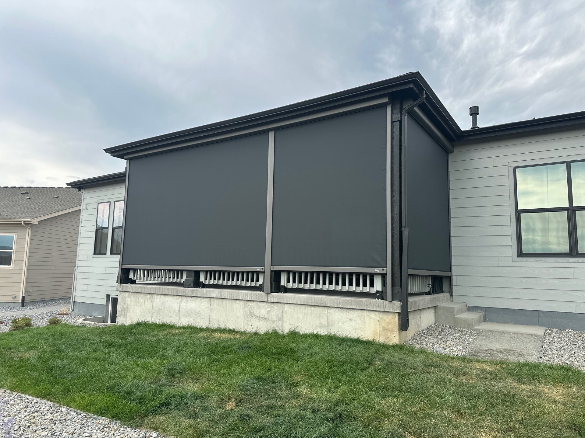 Retractable All-Weather MagnaTrack Screen Installation for Castle Rock Patio by Outdoor Solutions Colorado