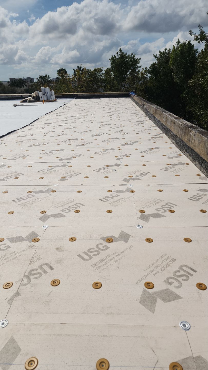 White TPO Membrane Roof Replacement at Doral Commercial Building by AJF ROOFING INC