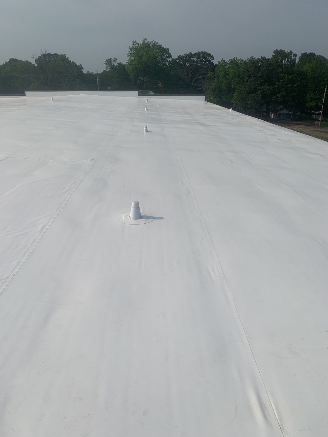 Commercial Roofing Installation using 50 mil PVC by Hostetler Roofing