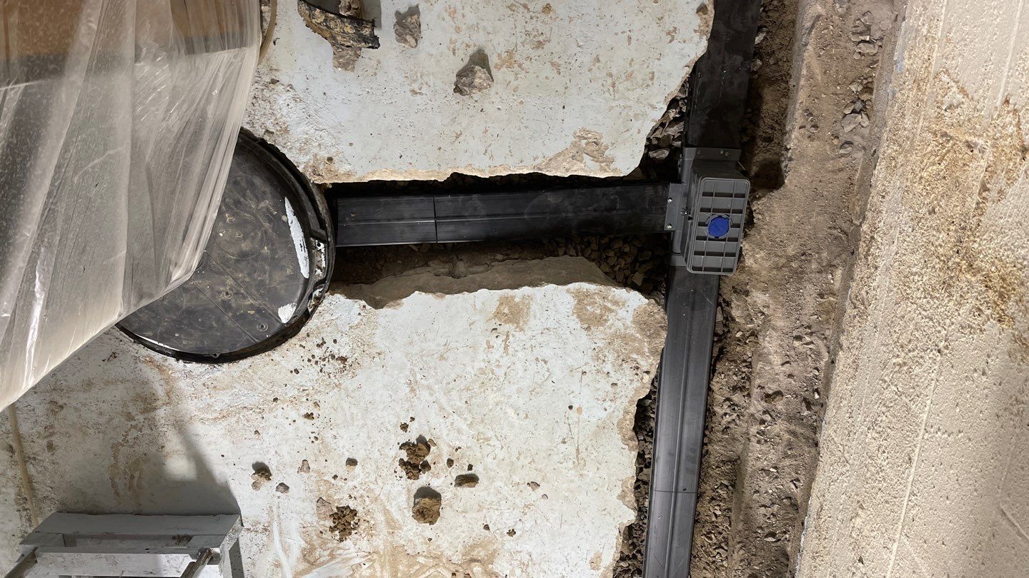Interior Waterproofing Using GrateDrain™ Products by Toledo Basement Repair