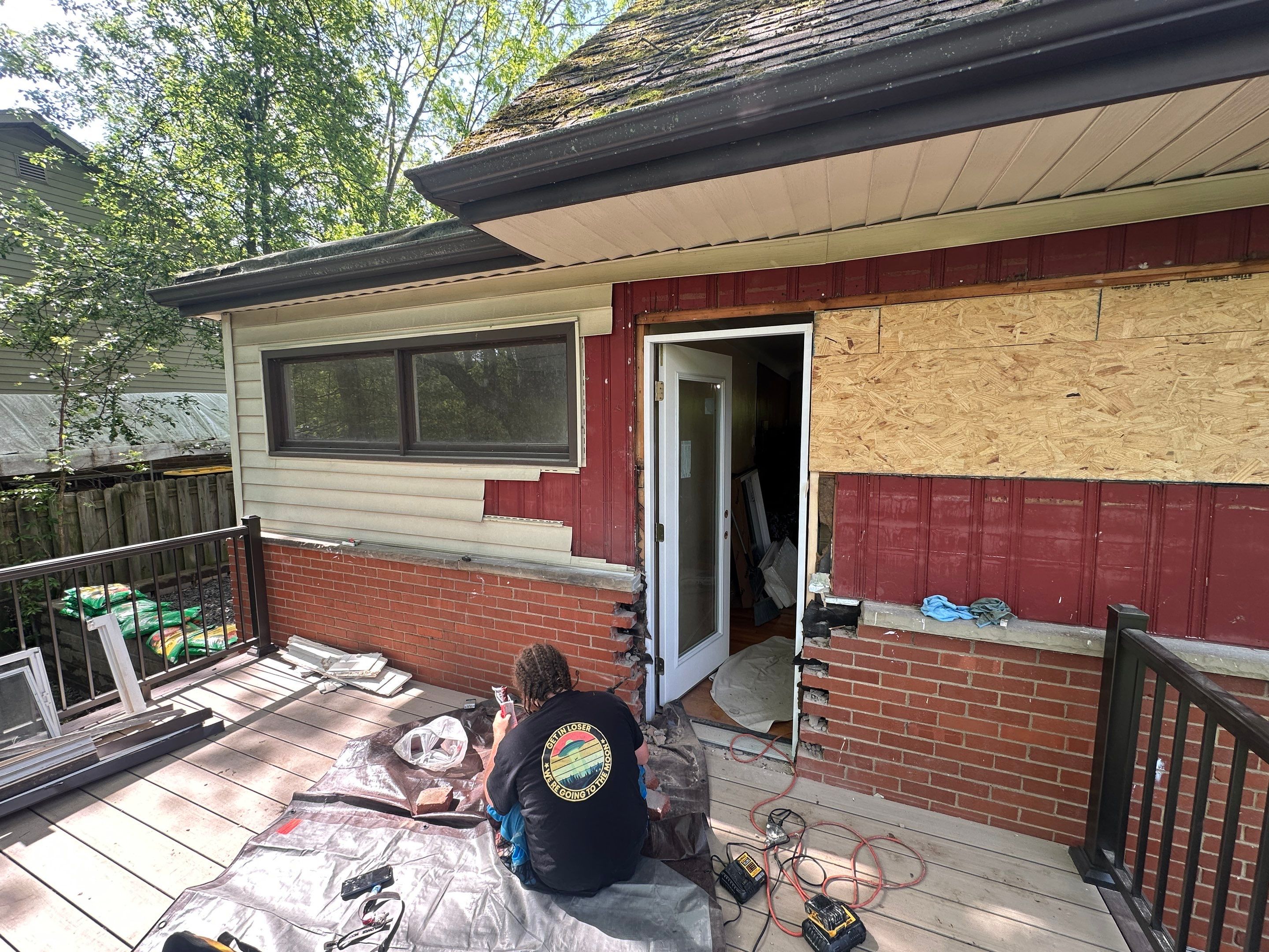 Deck and door install by Cousins Roofing Siding & Decks