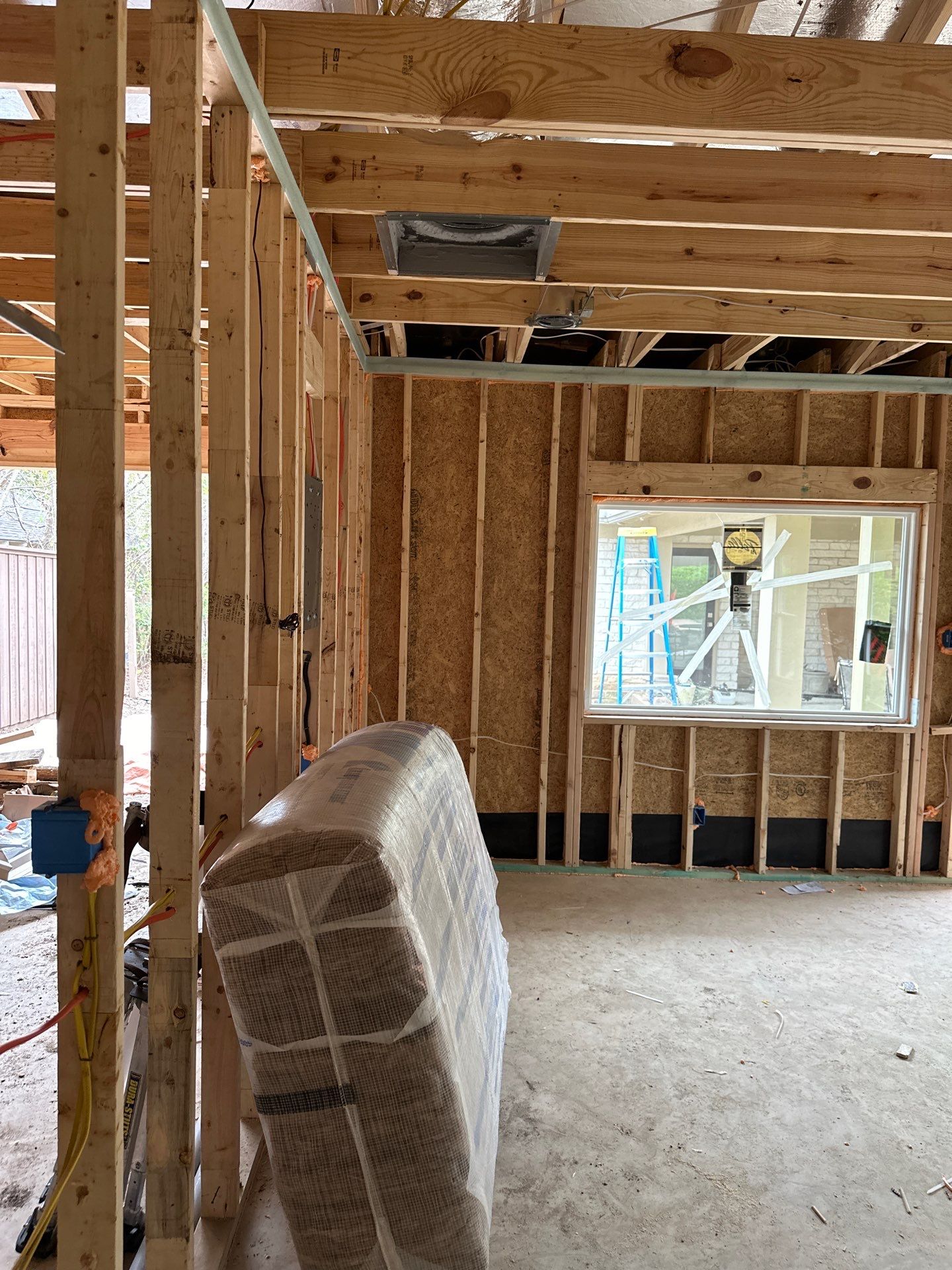 Batt install on Dallas home garage addition with a living suite.  by Apex Insulation Solutions