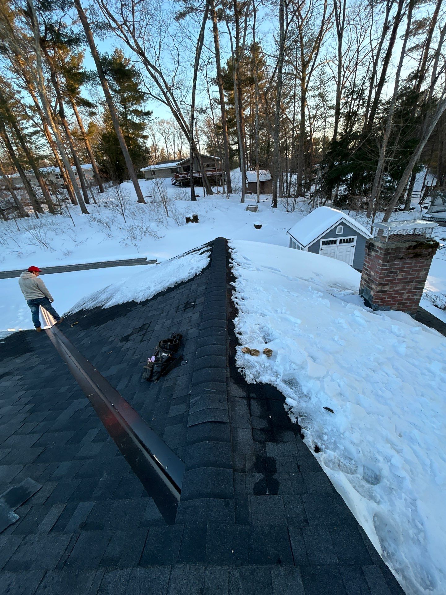 Ridge Cap Replacement & Black Metal Valley Installation in Chelmsford, MA by Mighty Dog Roofing of Greater Middlesex County
