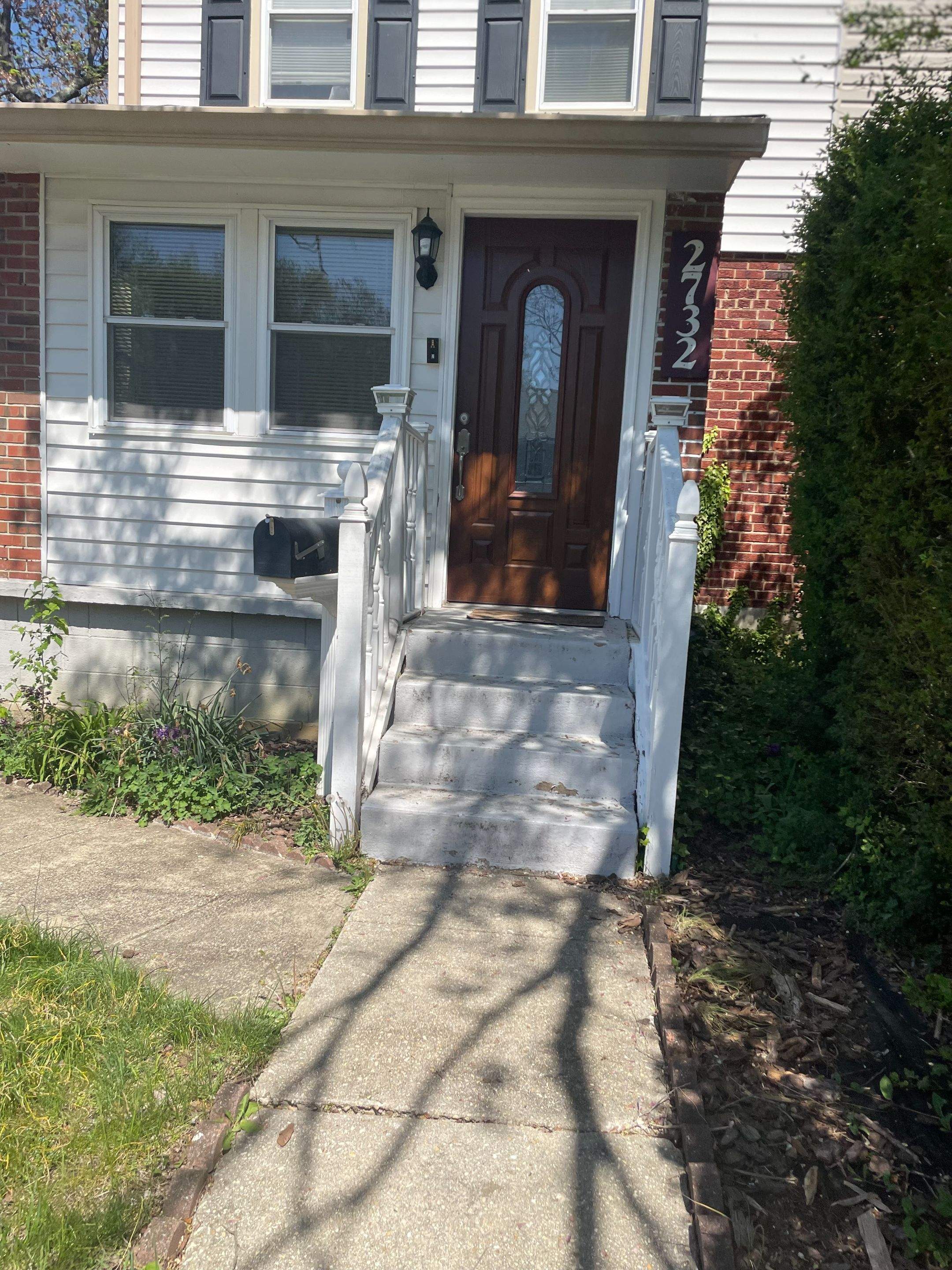 Deck resurfacing, railing replacement and concrete resurfacing by Fairfax Contractors, LLC